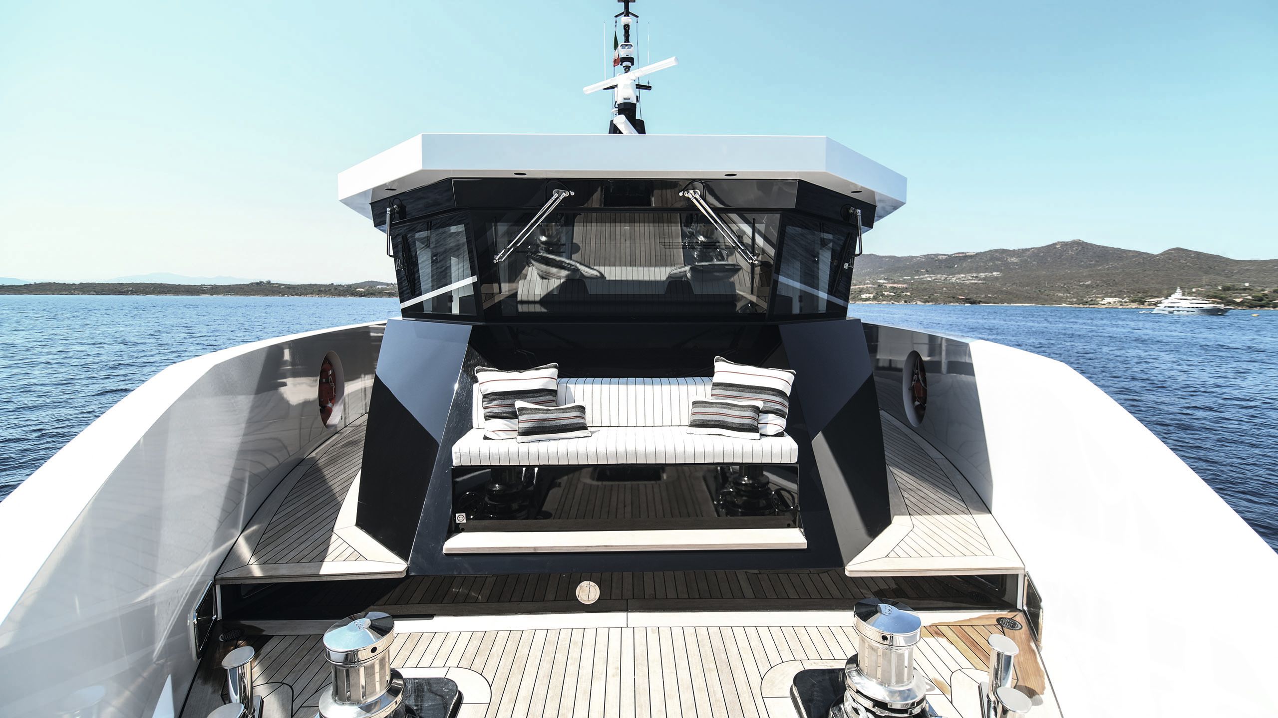 Facing the bridge with seating area in the middle ground