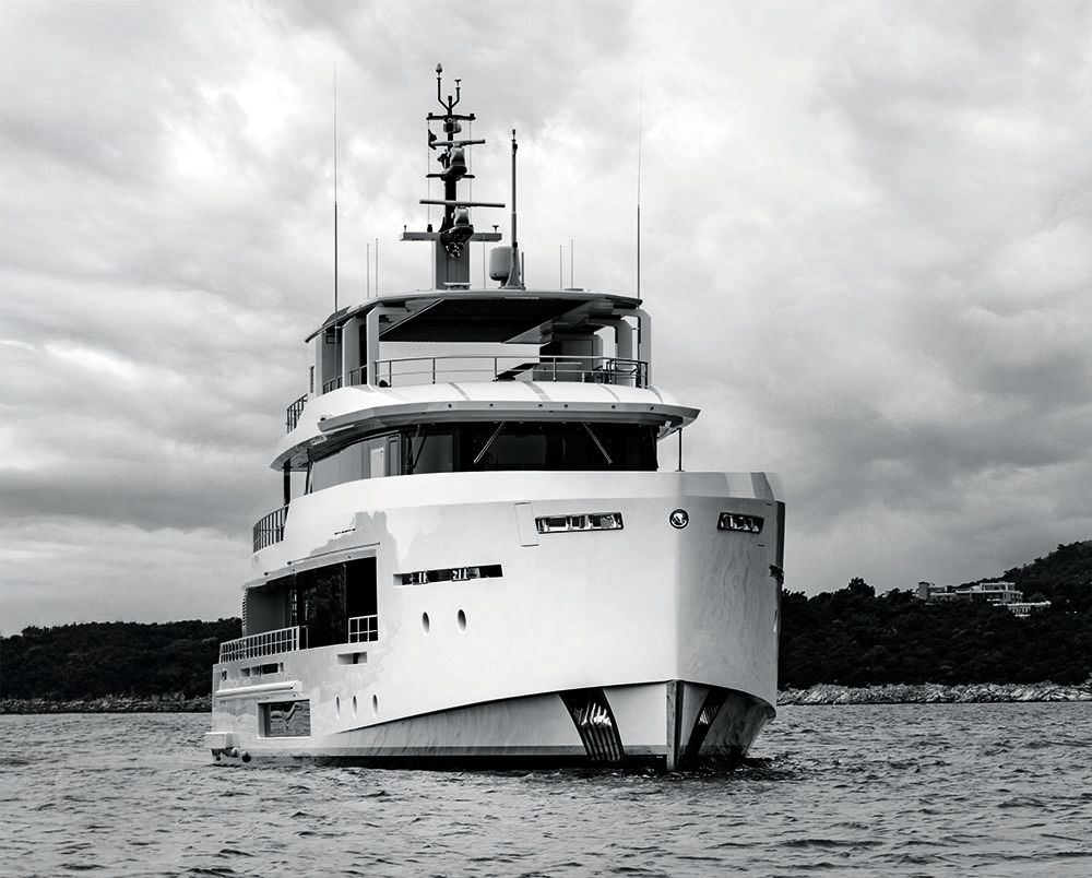 Black and white shot of Tremenda on the water, taken from the front