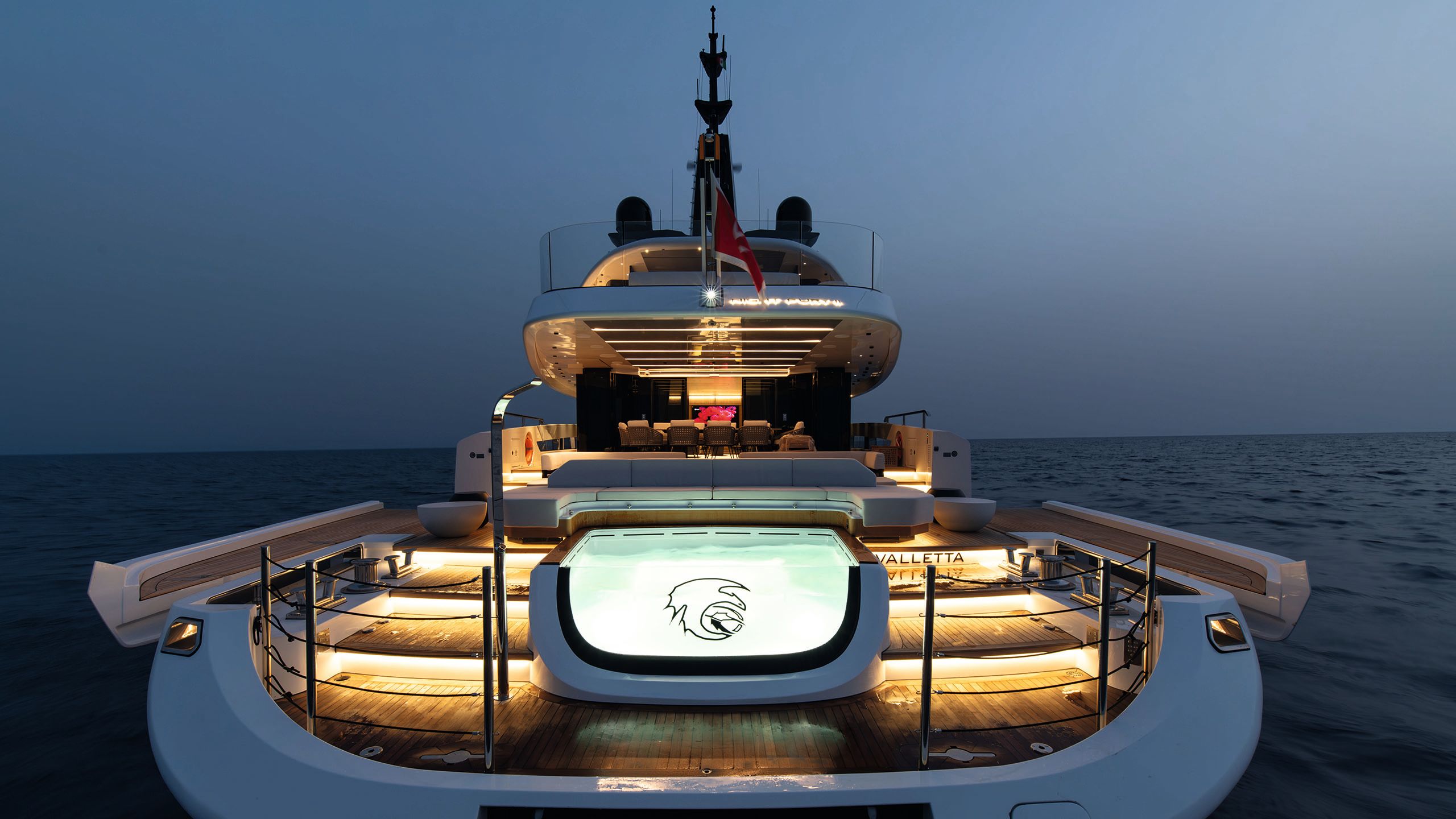 Night Fury II's pool lit up at night