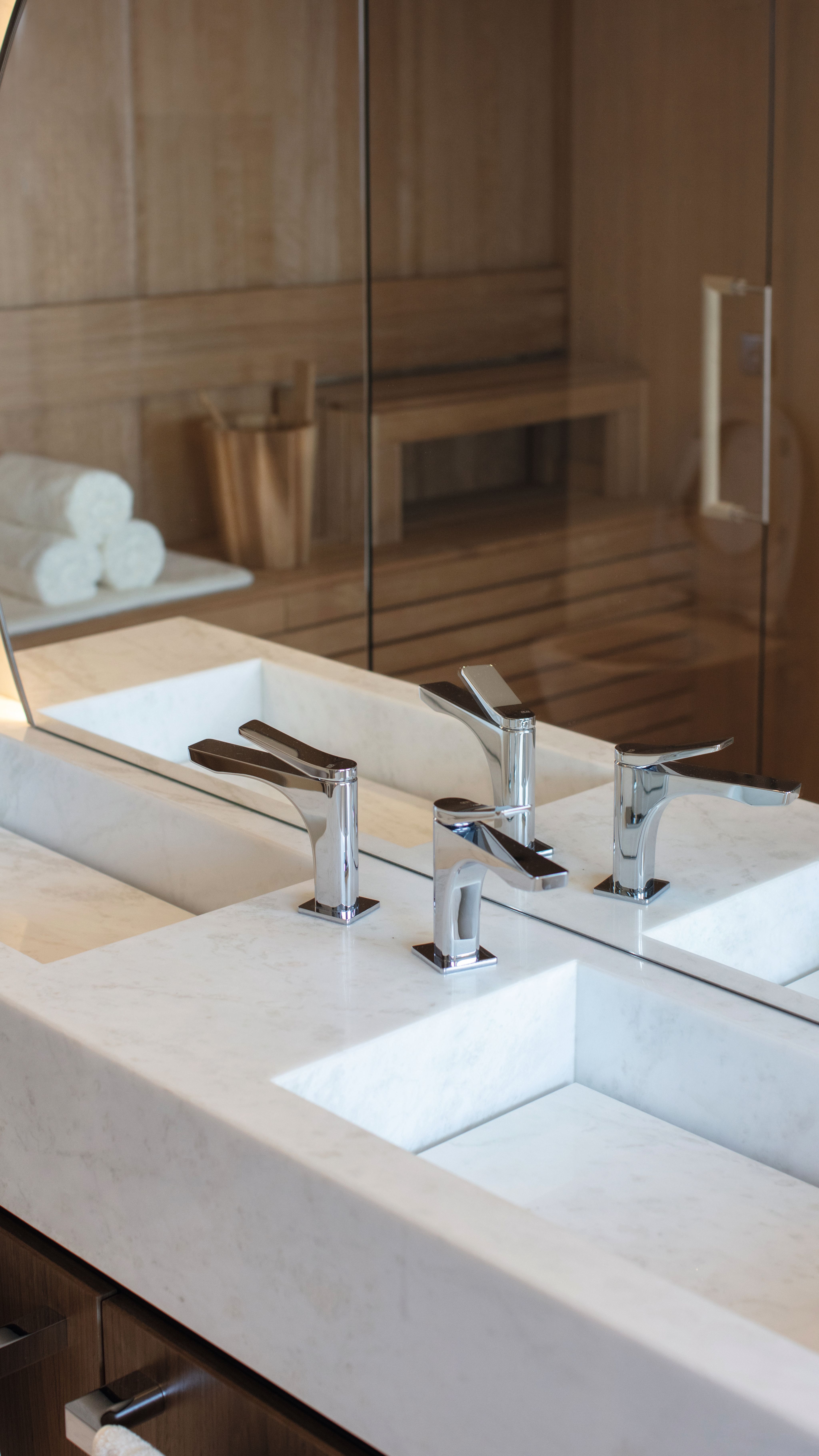 Square marble sink with chrome taps