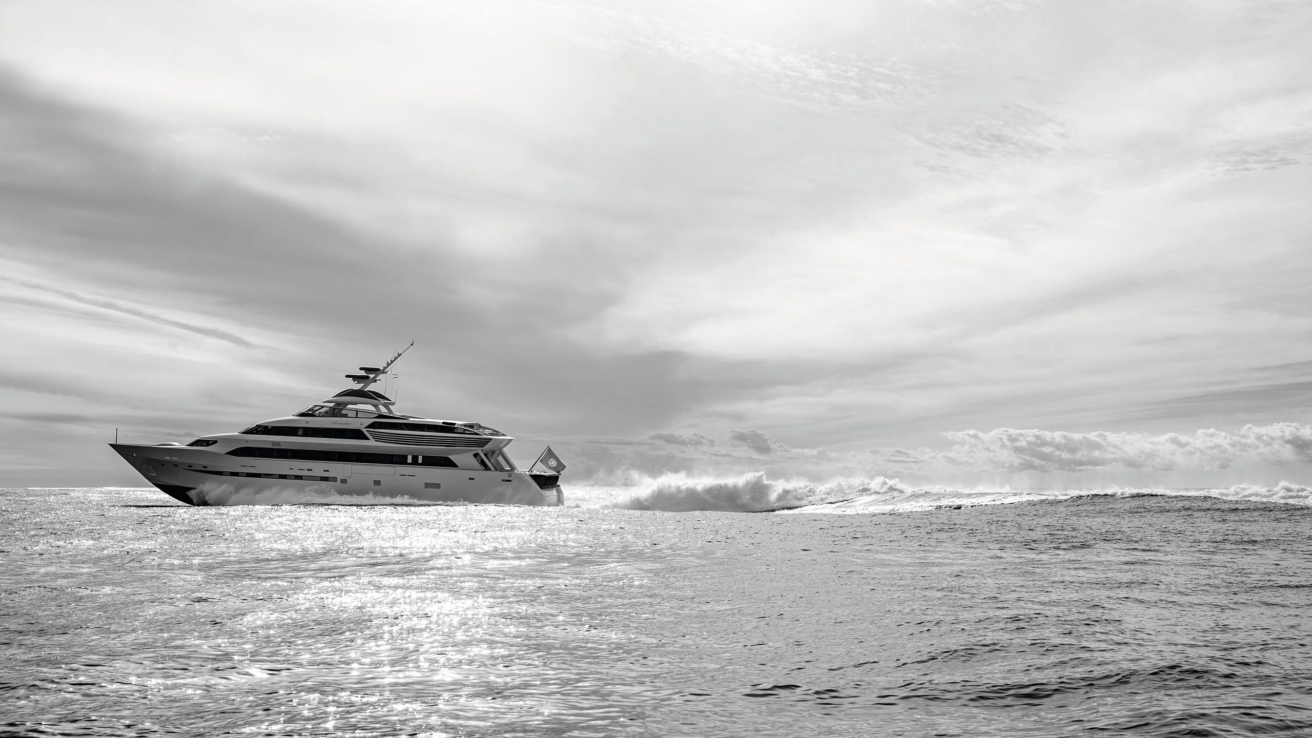 Black and white image of the yacht Alamshar on the water