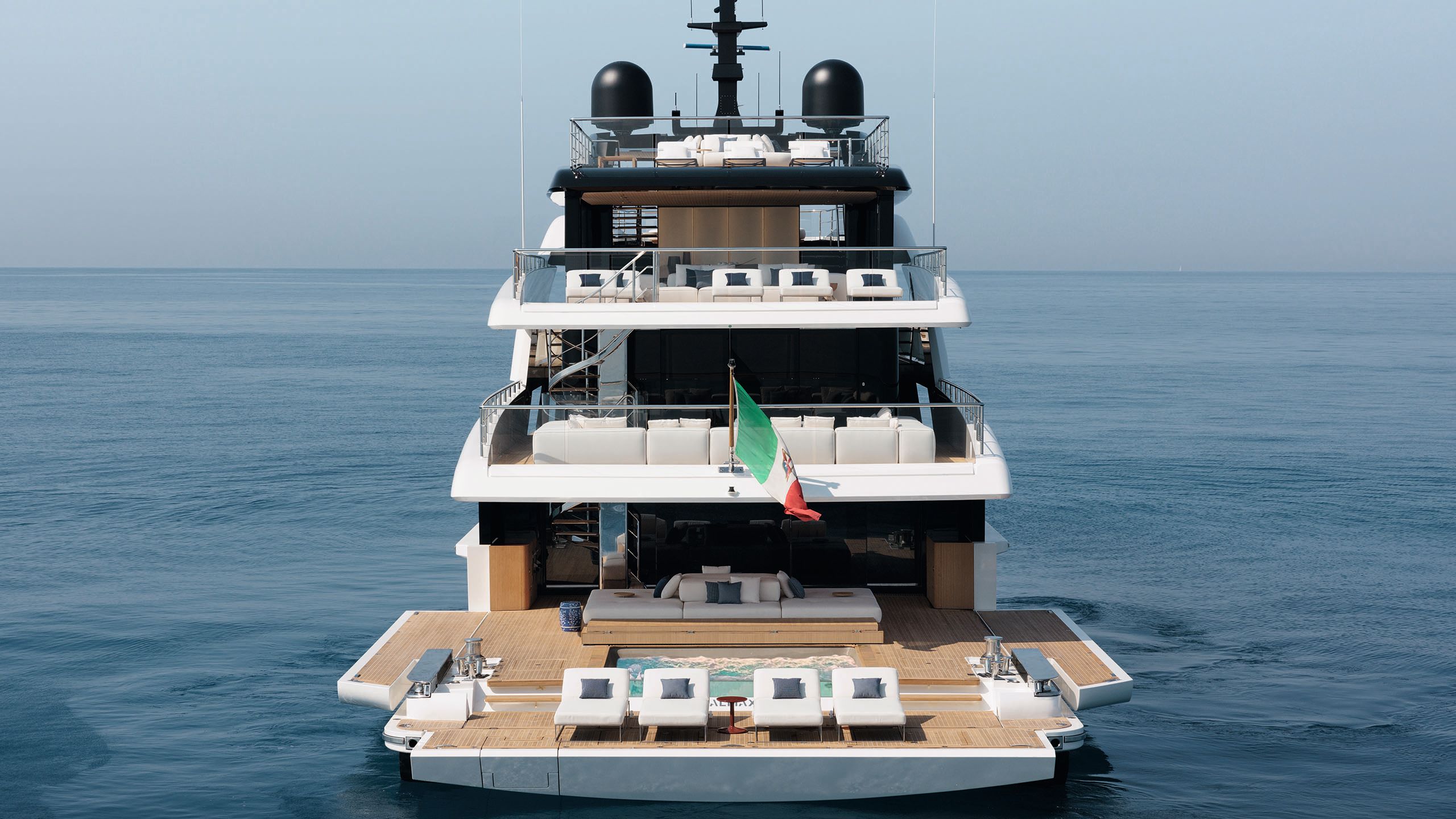 Almax from the back showing each deck with the sun loungers at the front