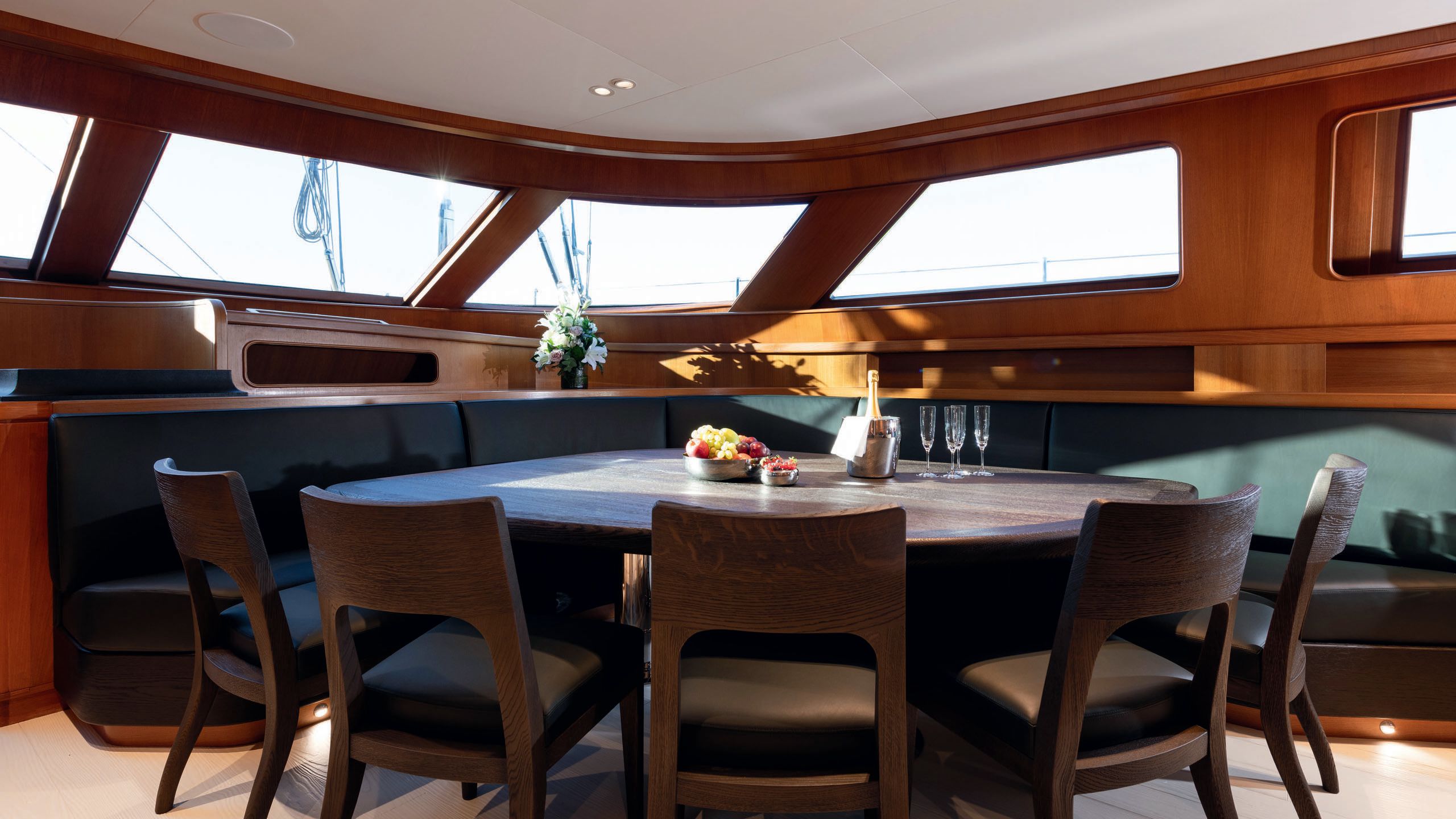 A dining table with chairs surrounding it