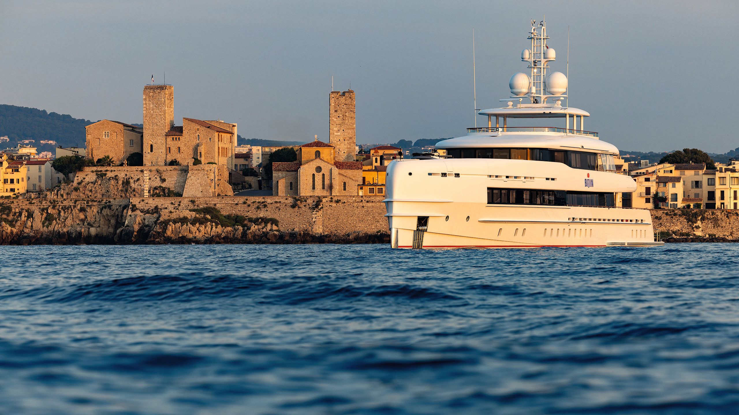 Bijin on the water from the side - the setting sun is shining directly on to it