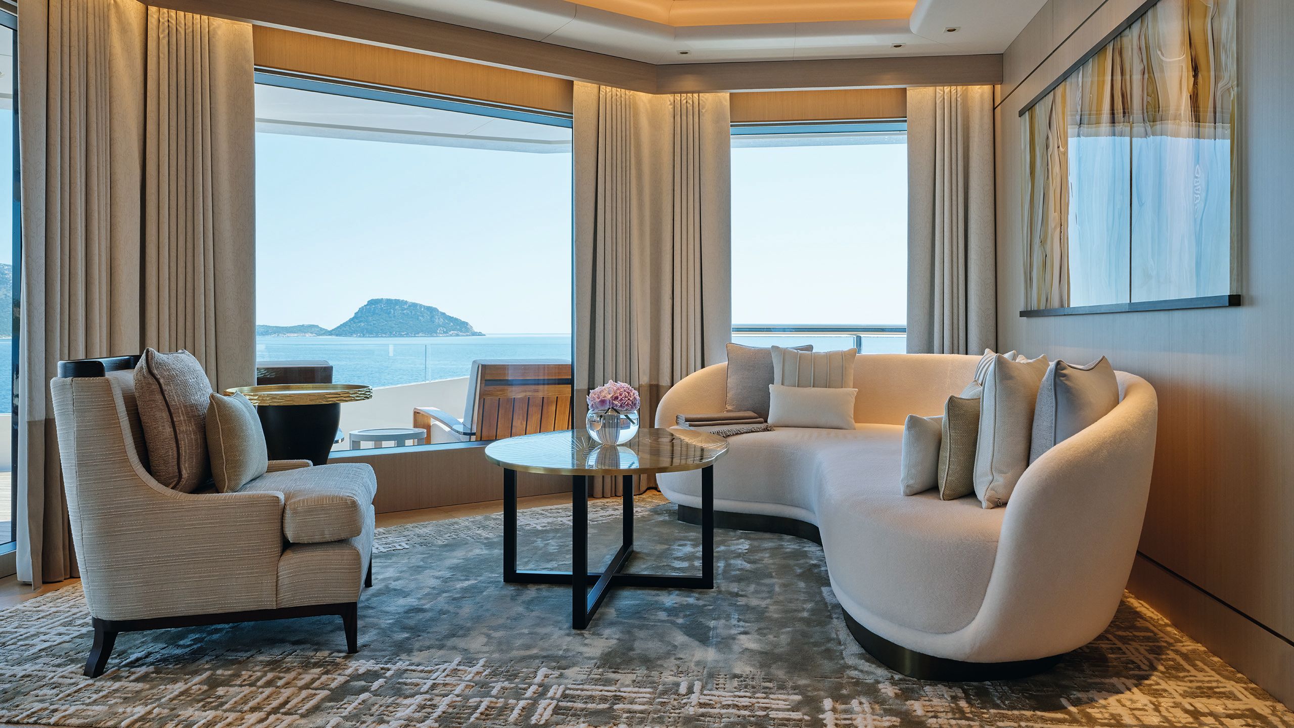 Sofa area in the main cain with cream sofas and coffee table