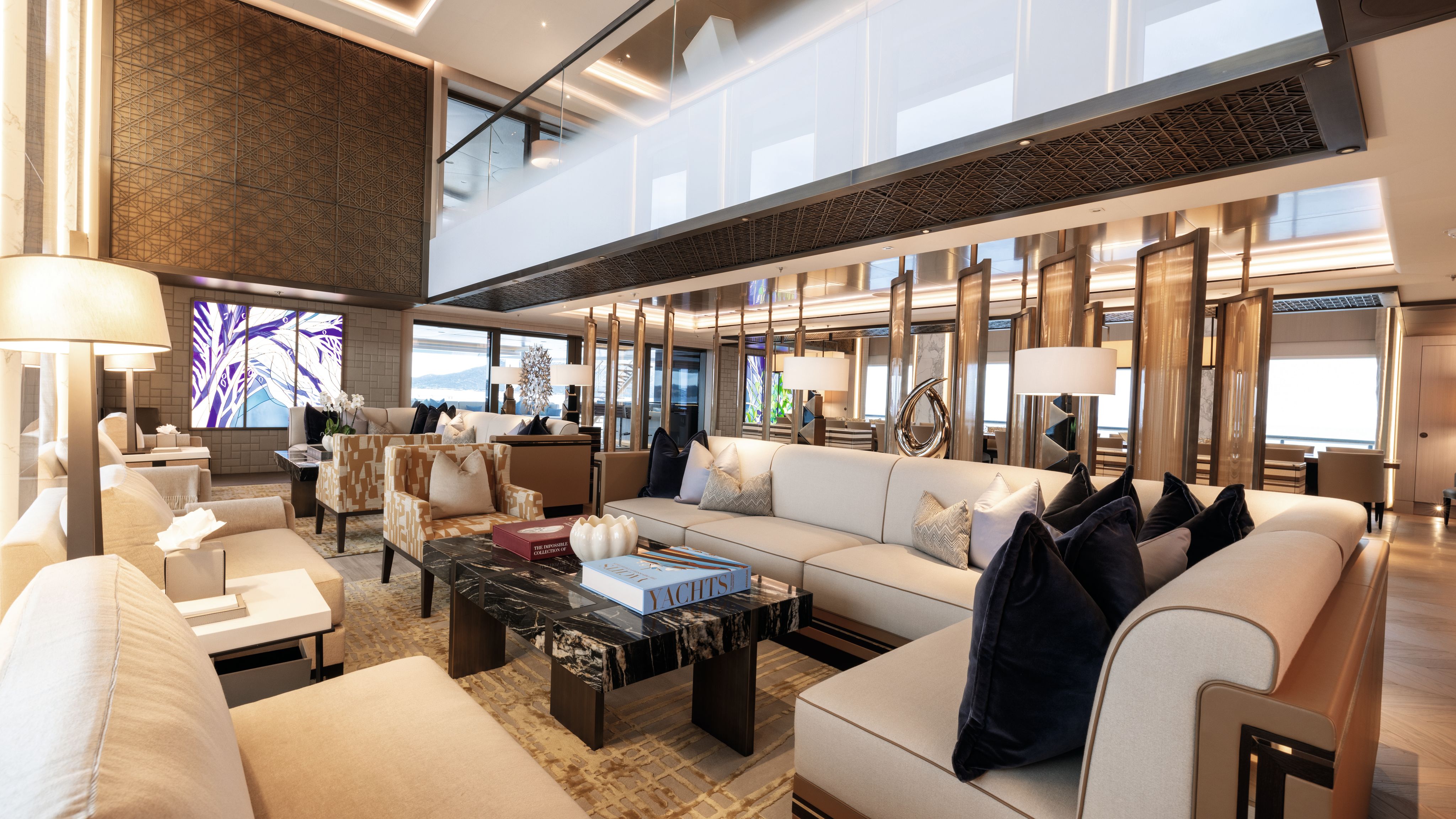 Main saloon in brown, beige and cream with corner sofa
