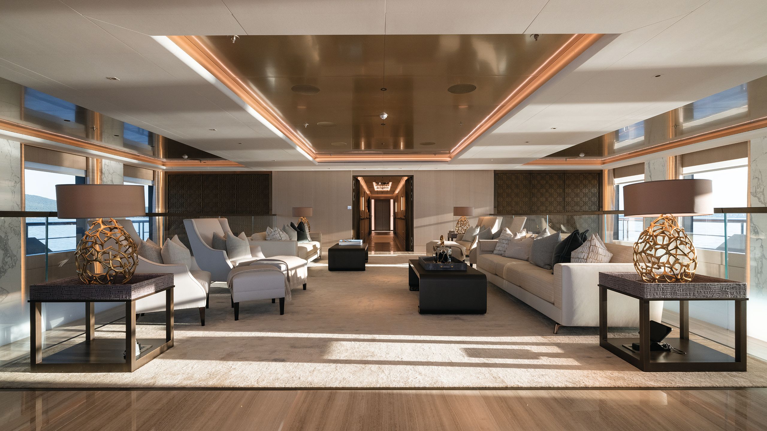 Large lounge area with soft seating in neutral colours