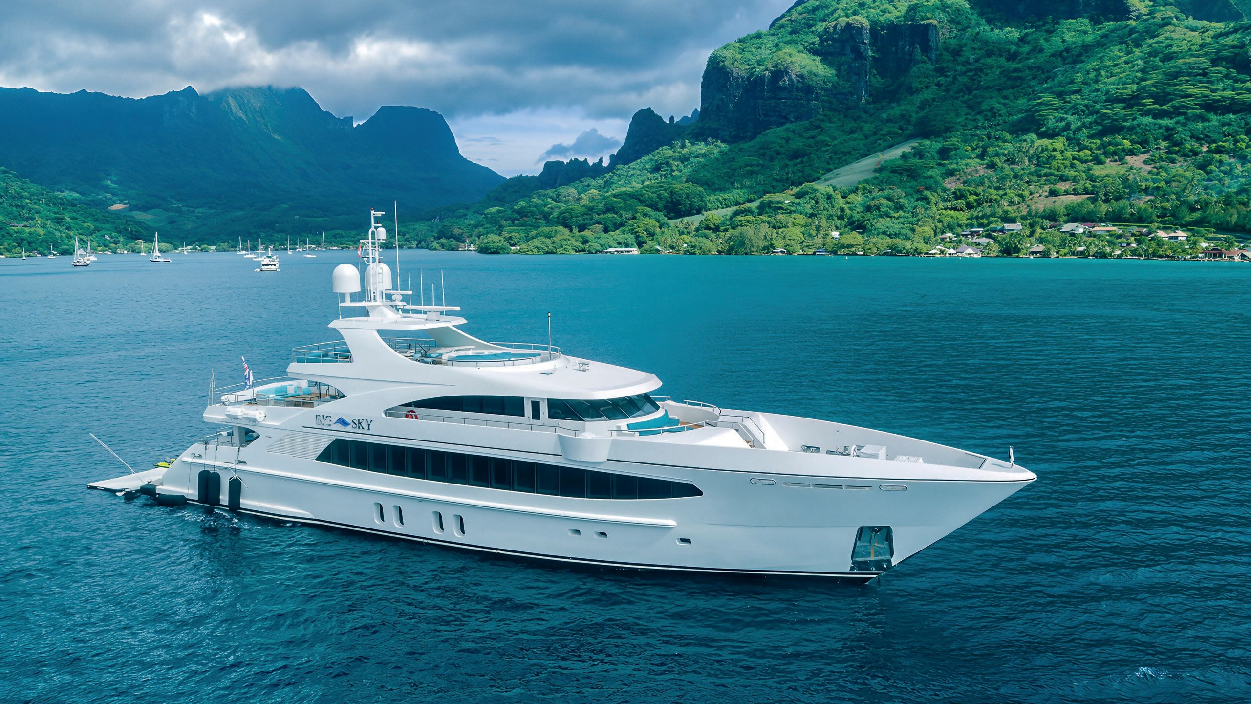 A side view of Big Sky on the water