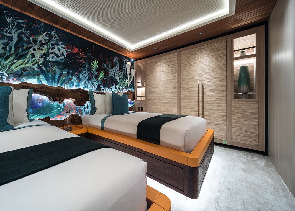 Guestroom with wallpapered headboard