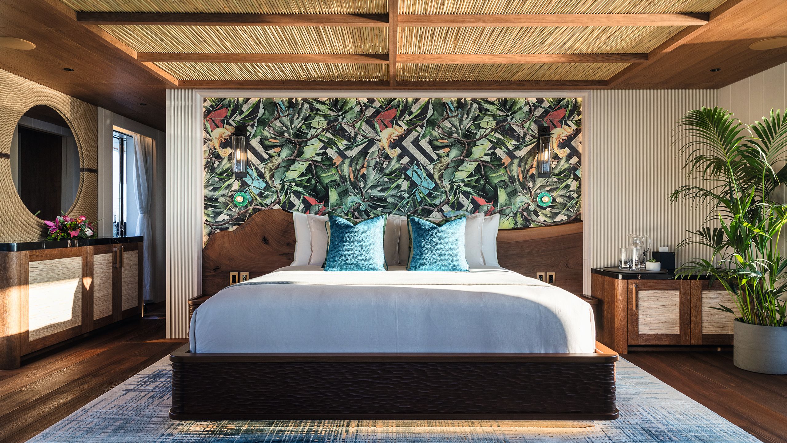 View of bedroom and patterned wallpaper