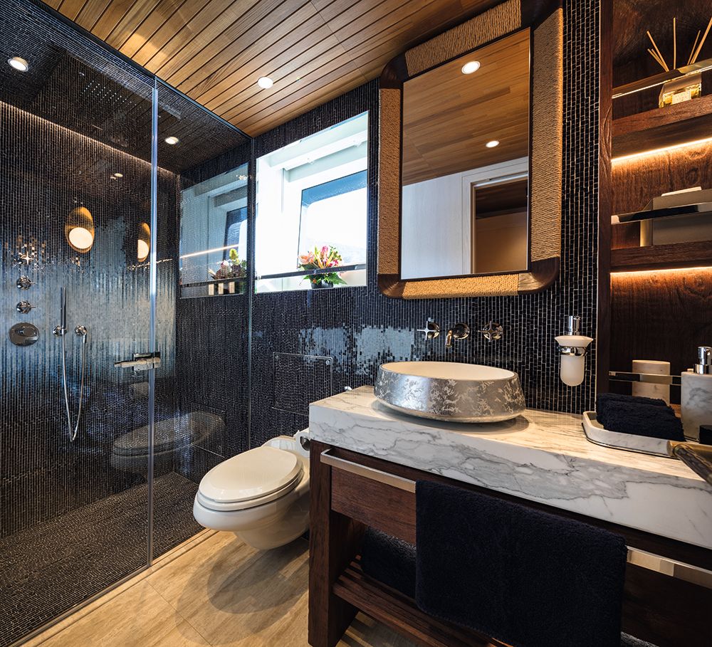 Interior of the blue-tiled bathroom