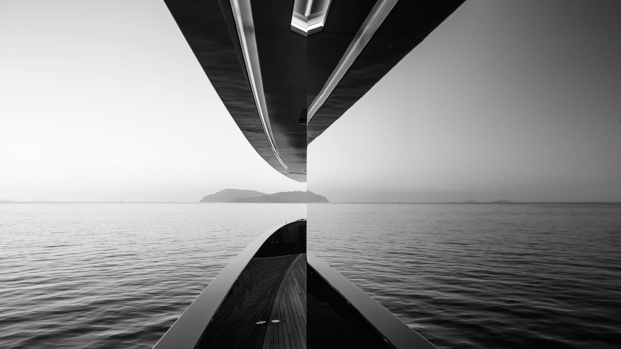 Black and white shot of side of deck and window