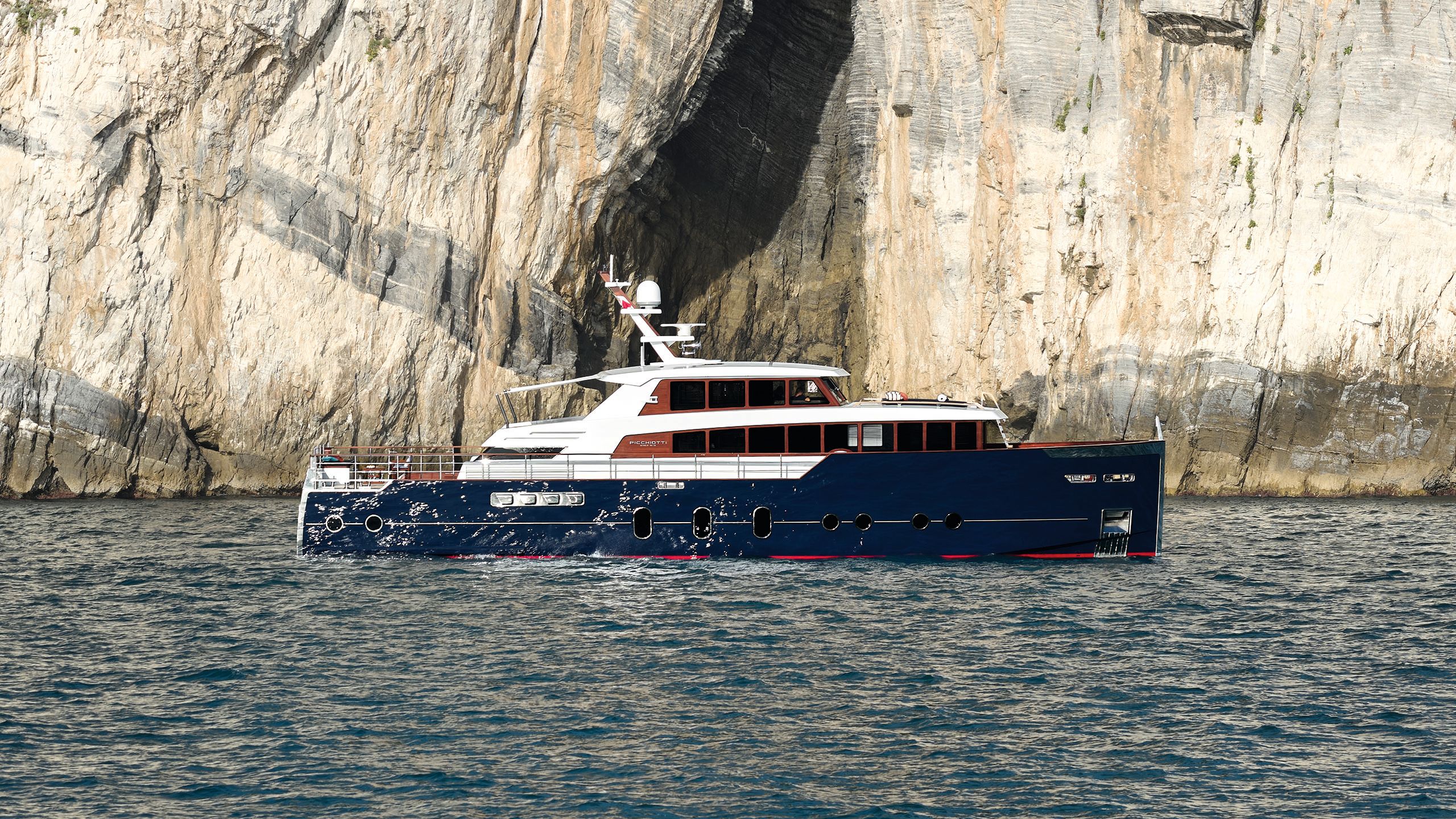 Side view of Gentleman's Yacht on the water