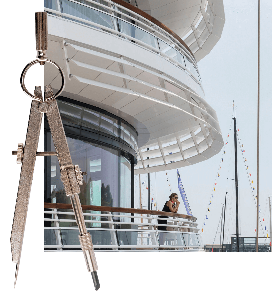 Composite image of a pair of compasses and a person looking out on a balcony