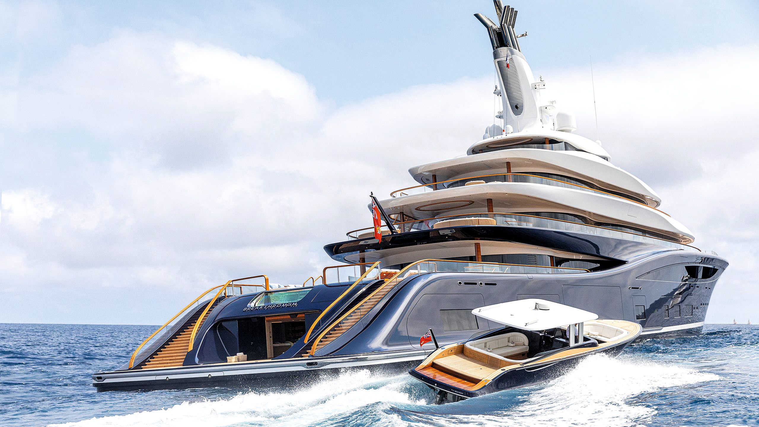 Breakthrough on the water from the side and back. A tender is alongside it