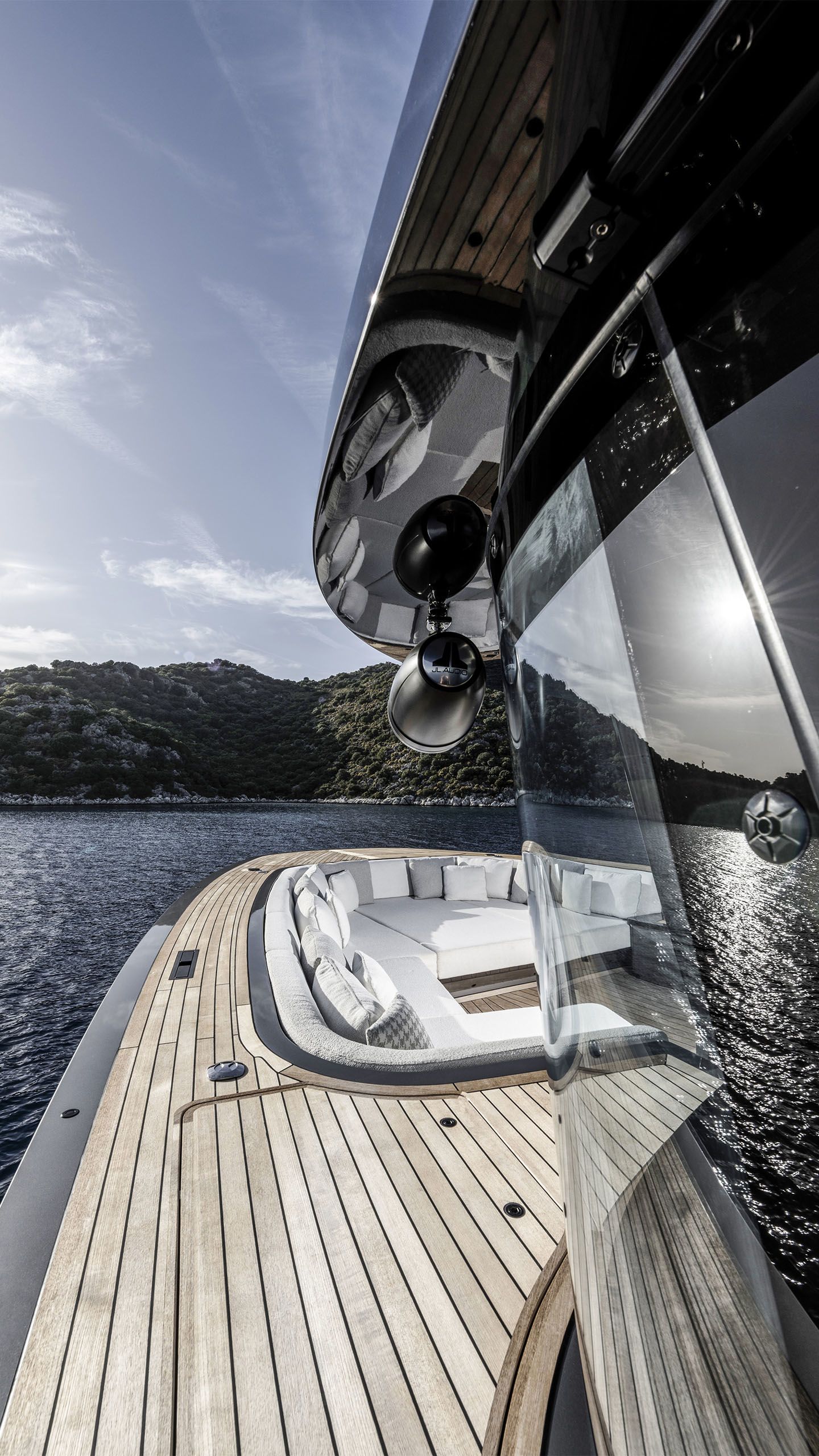 Looking along the side of the deck towards the built-in sun loungers
