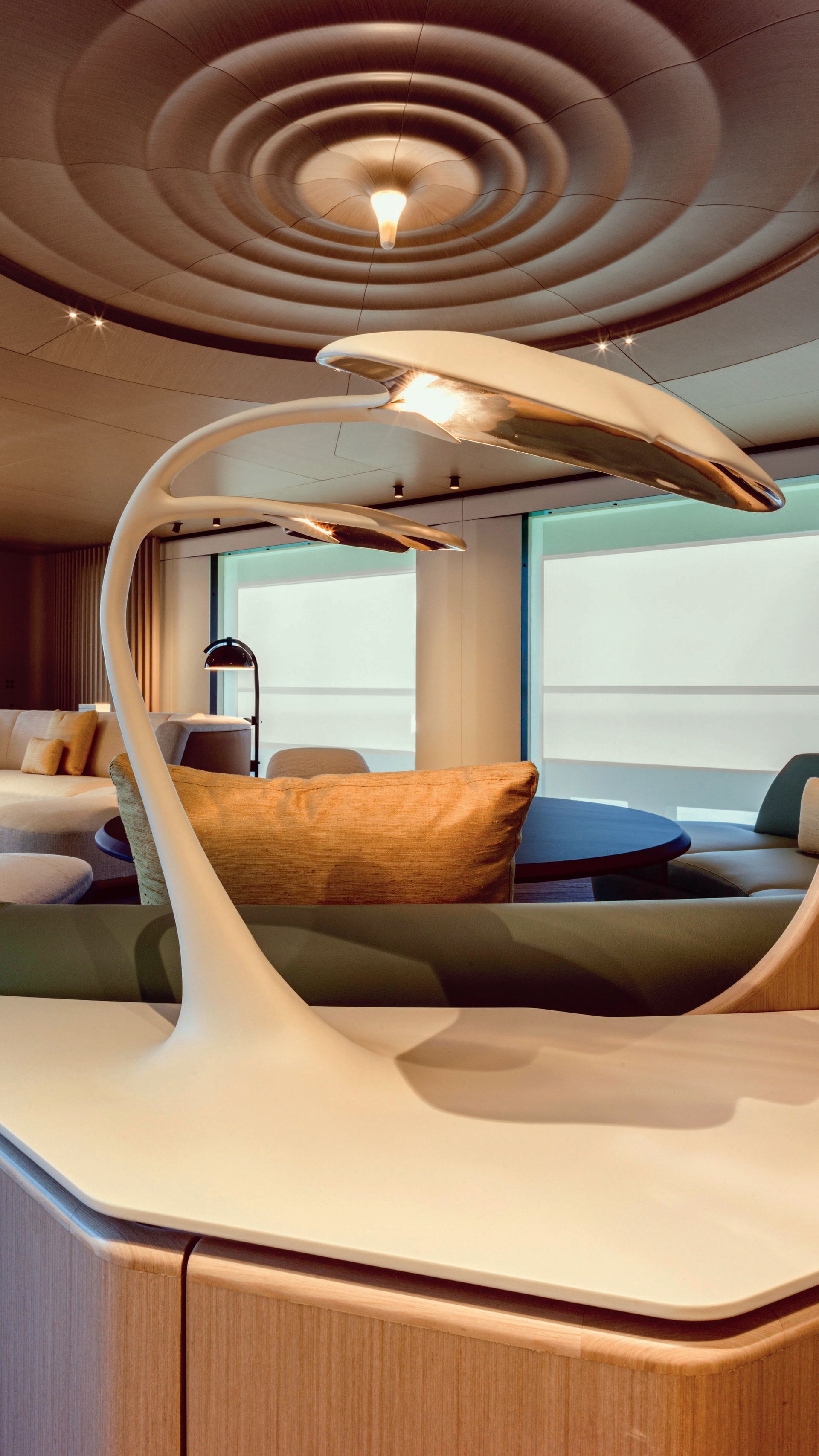 An abstract shaped lamp moulded into the table