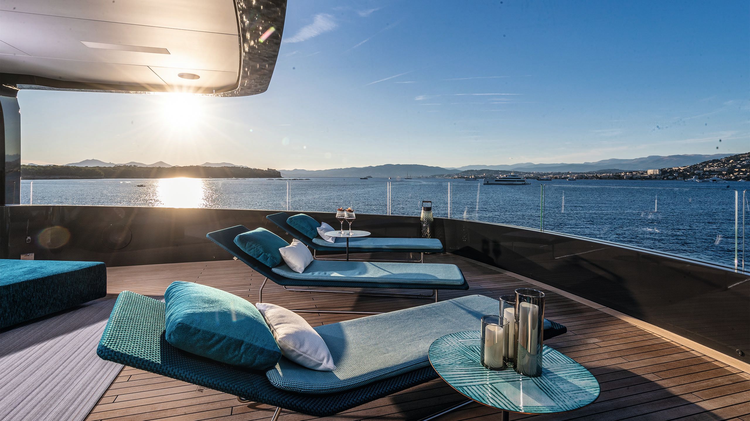 Side view of blue sun lounges on the sundeck