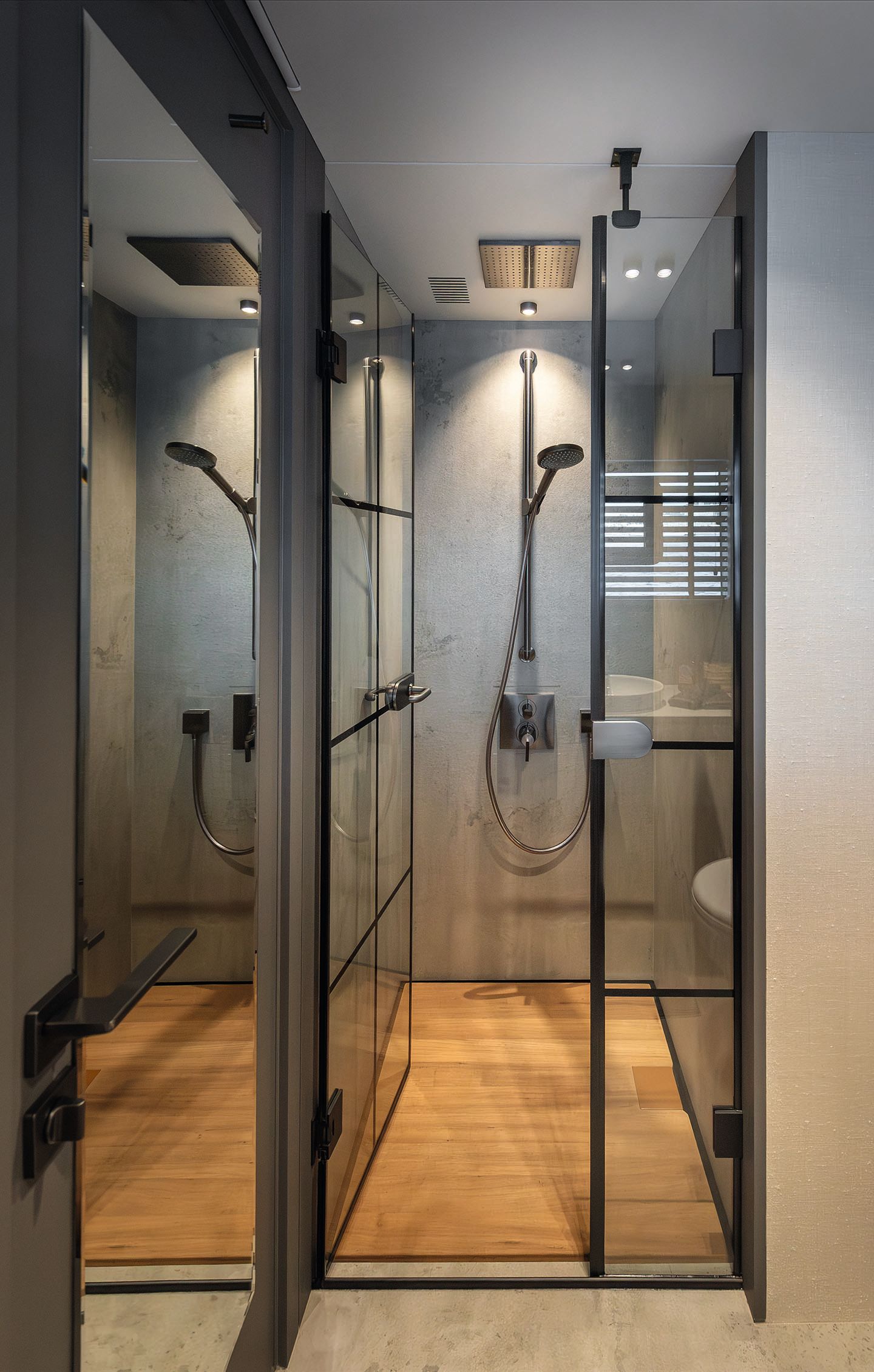 A shower with black fittings