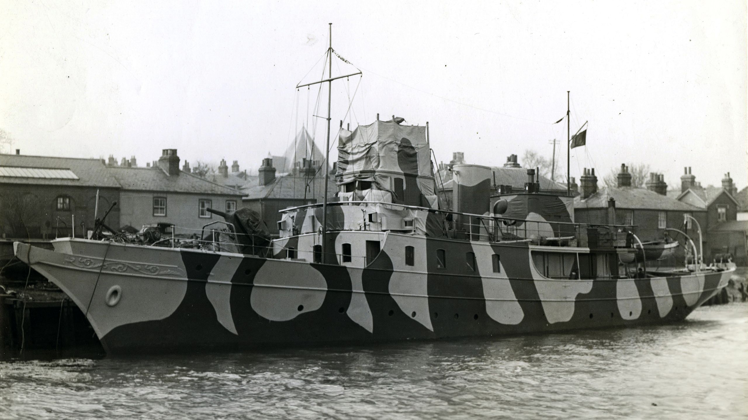 Black and white photo of Llanthony on the water before it was restored