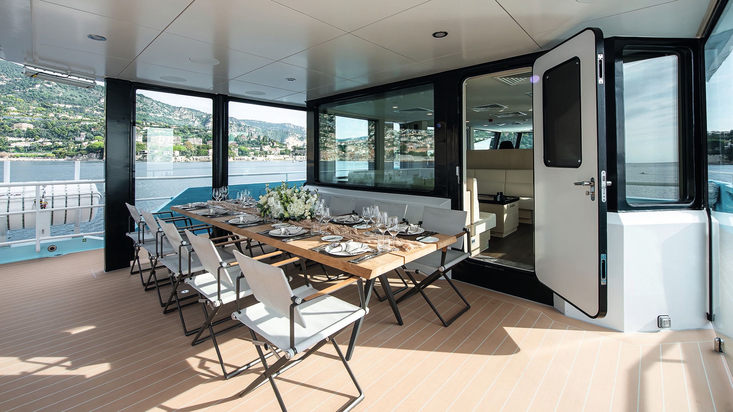 An outdoor dining table set for ten