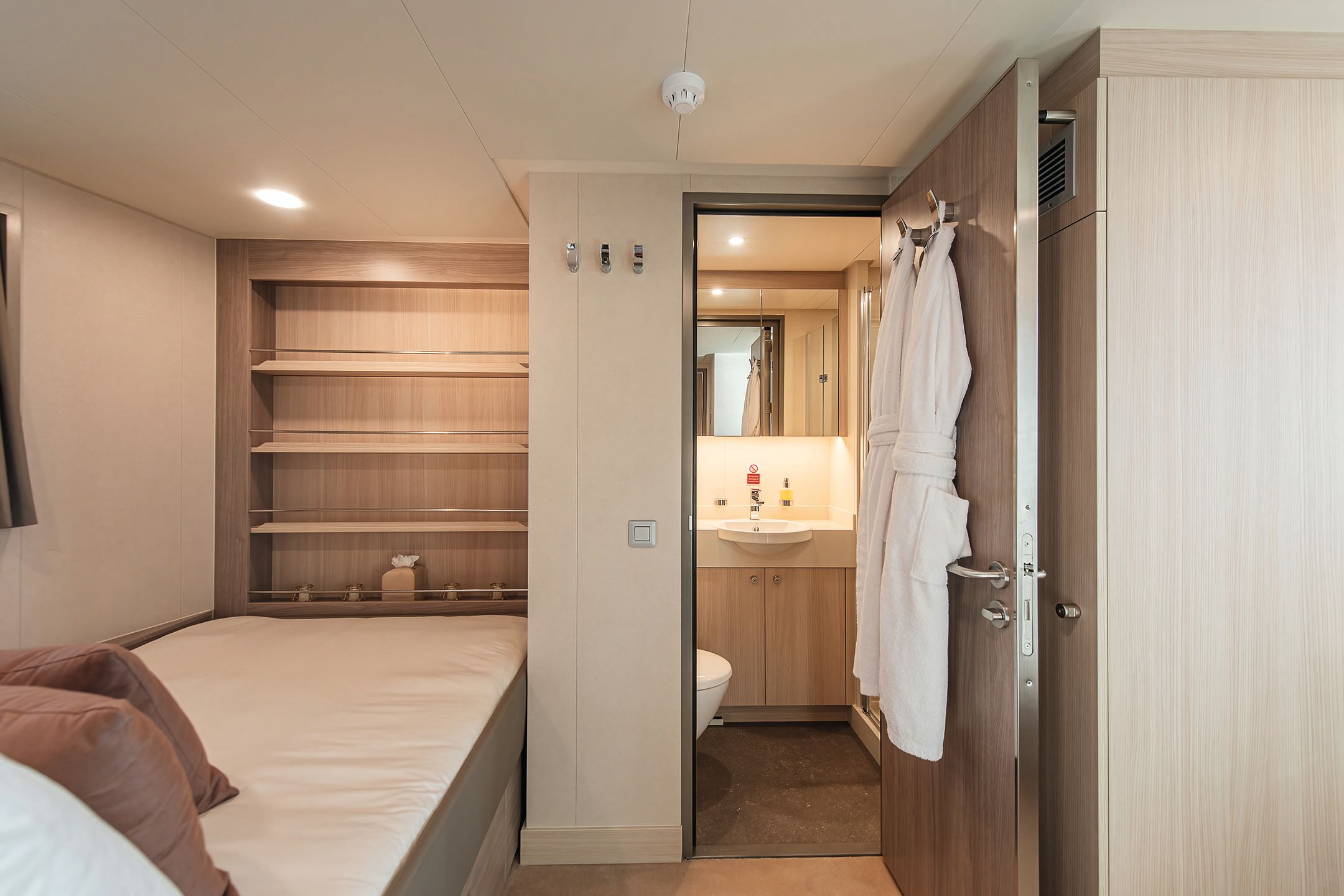 Small guest room with single bed and en suite