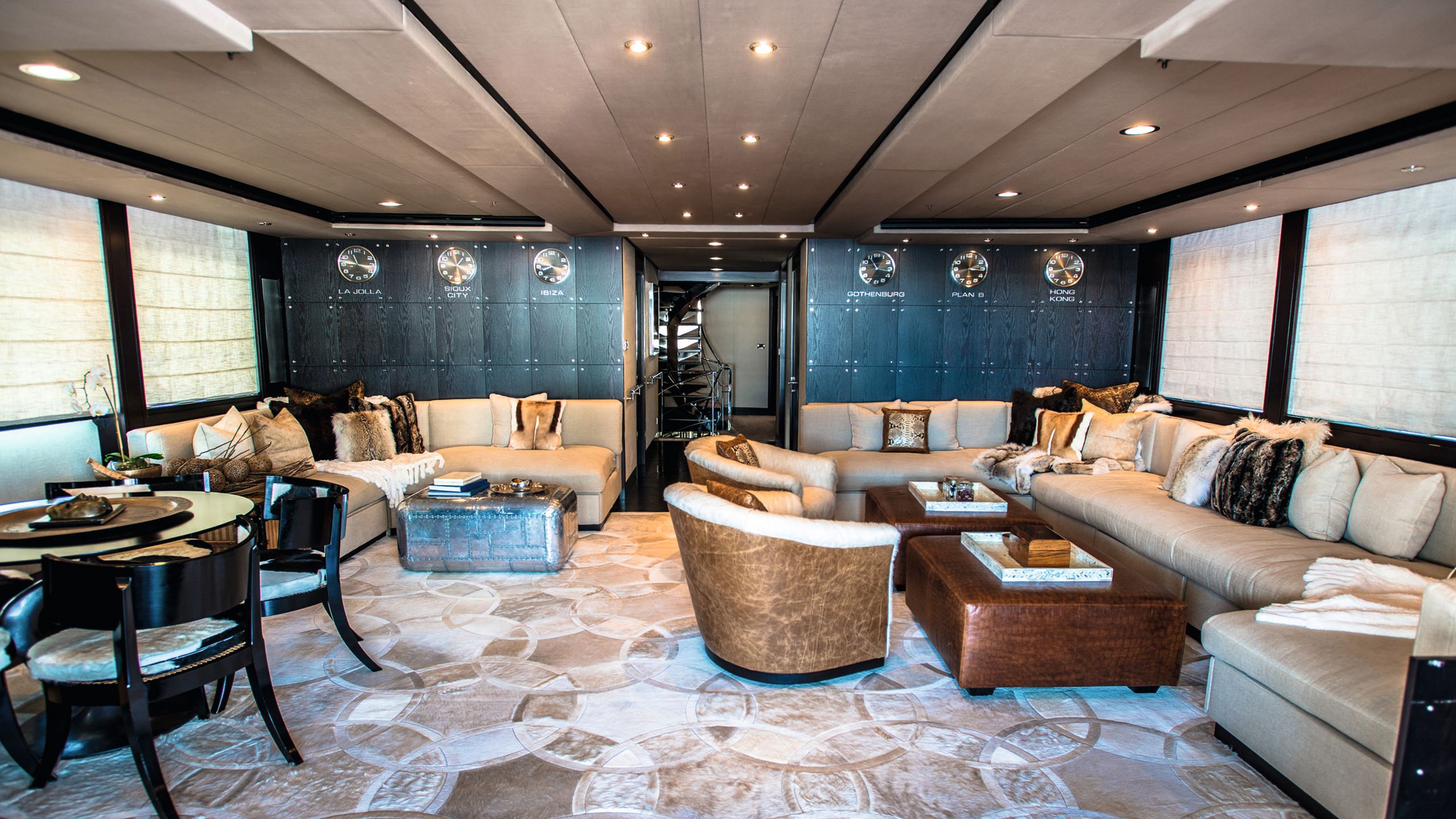 The main saloon before the refit. It features dark wood and metallics