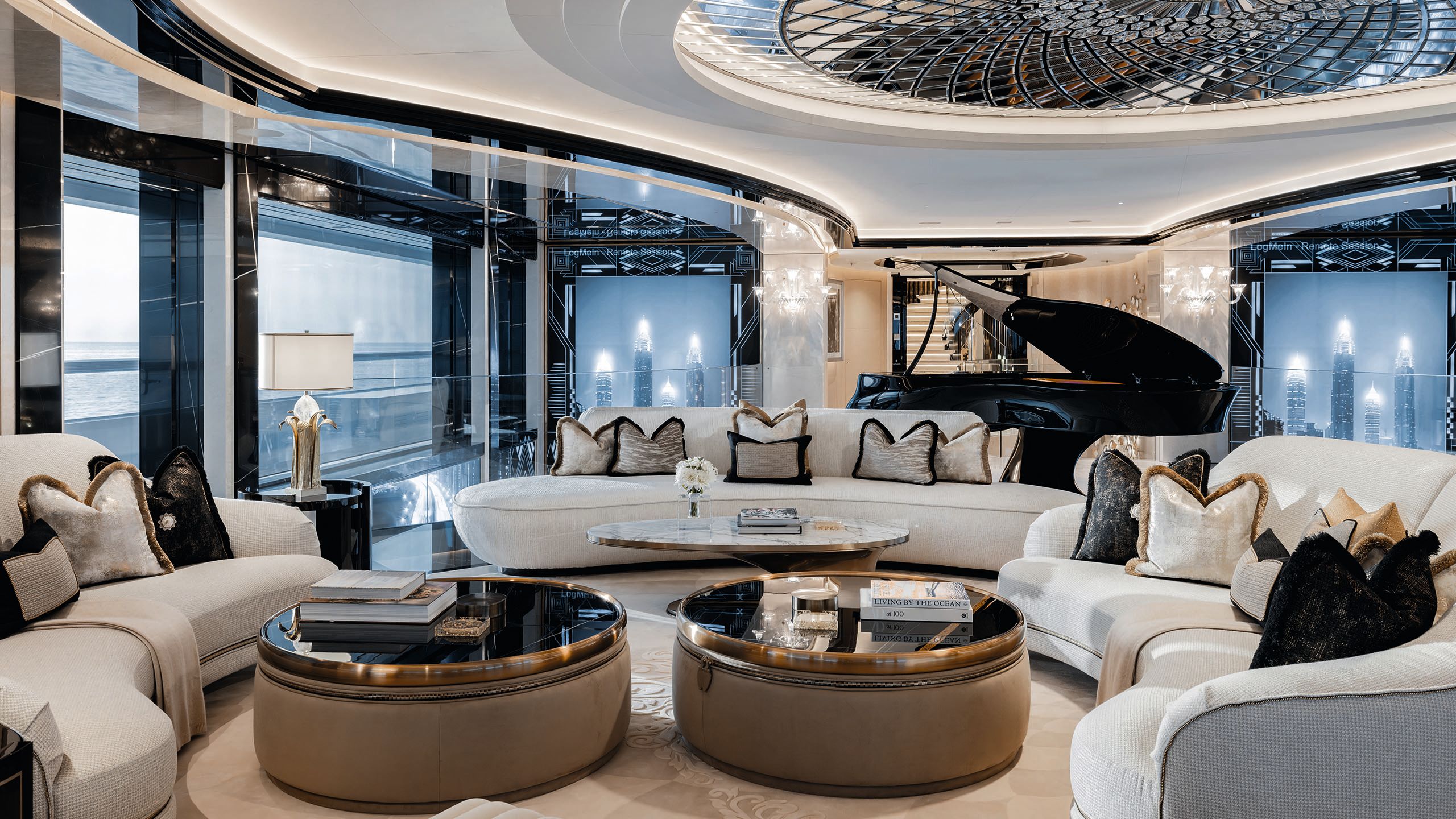 A lounge area with three curved white sofas, black lacquer-topped round tables and a black piano at the back