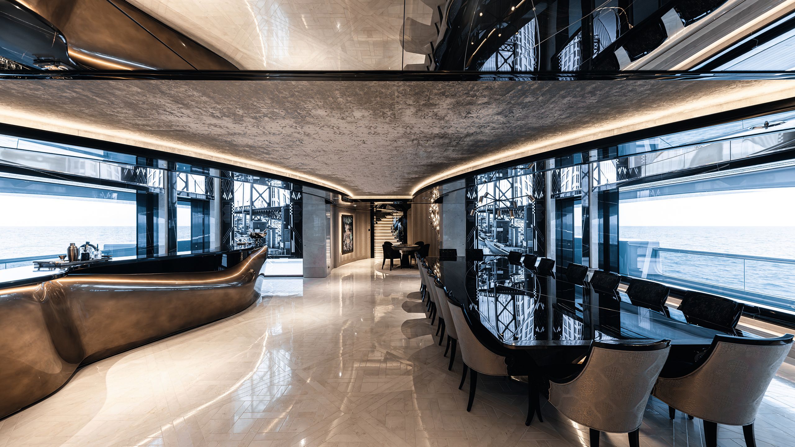 Long black dining table with seats for 18