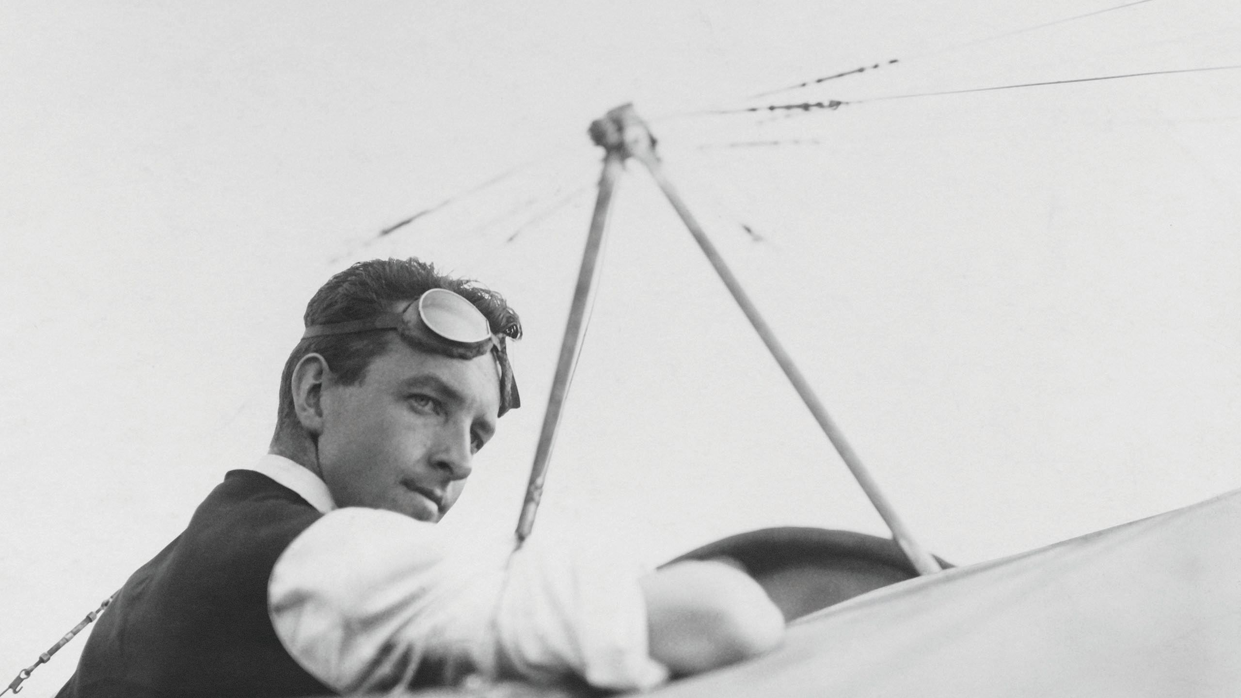 A black and white photo of Thomas Sopwith in a plane
