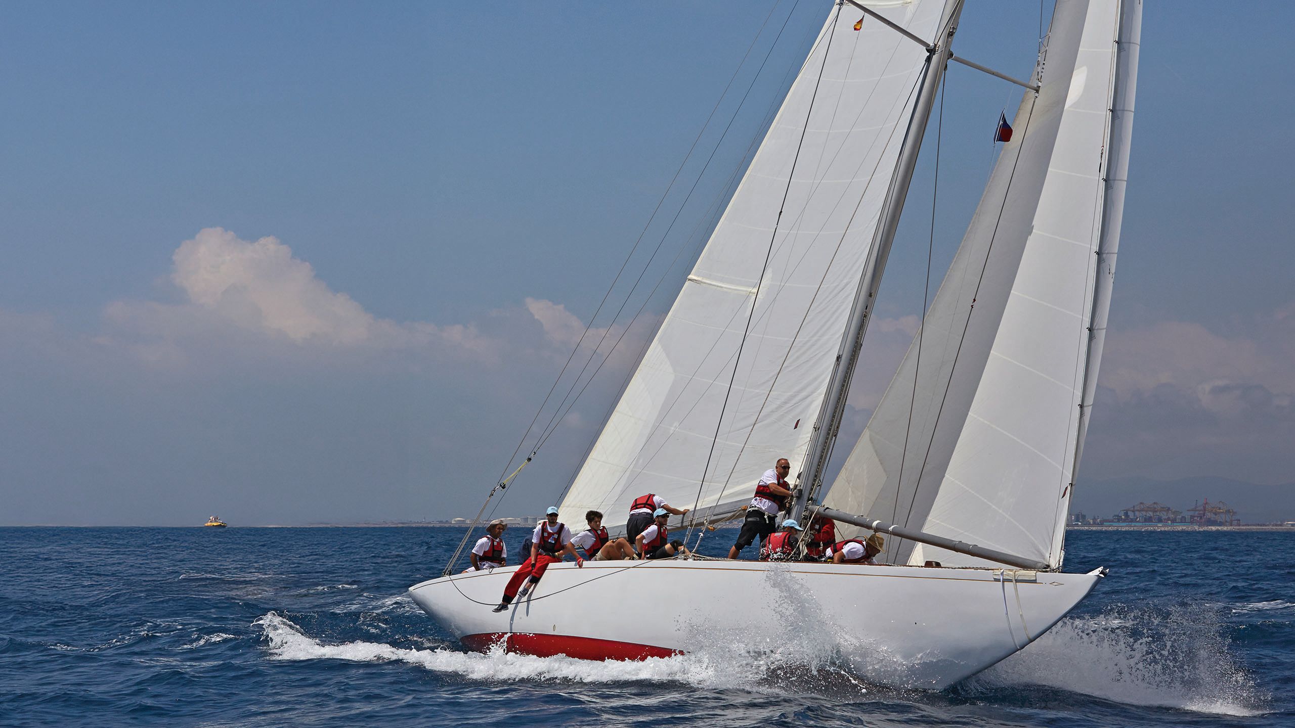 Colour photo of Vim on the water with its sails up