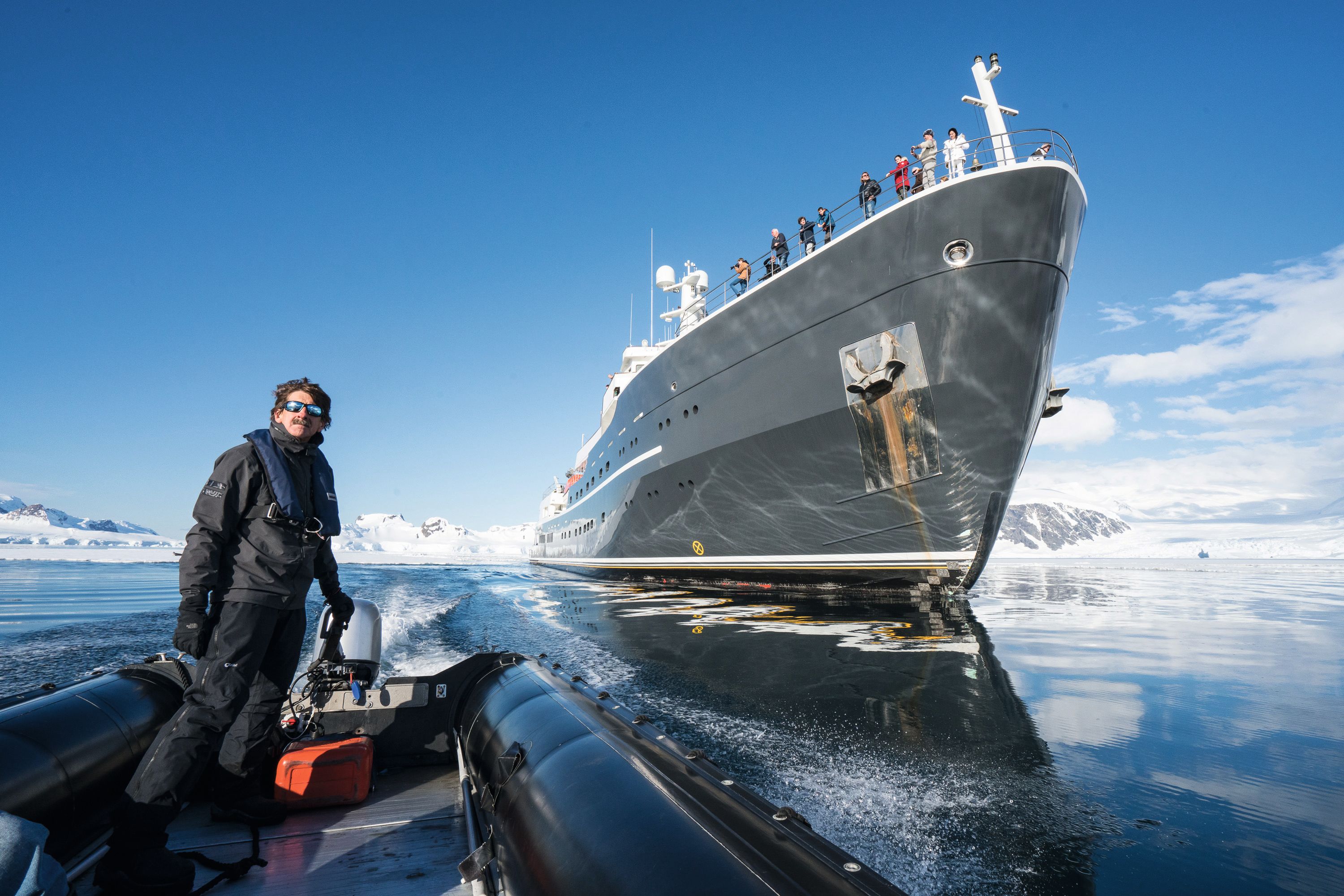 Skip Novak pictured alongside boat