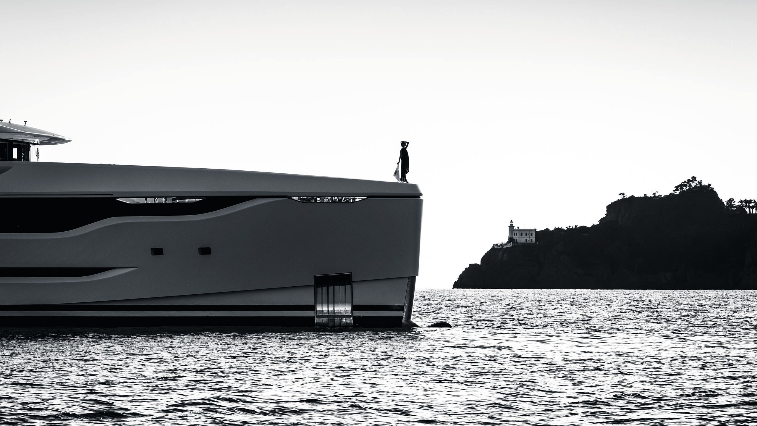 Side view of O Madeleine on the water in black and white