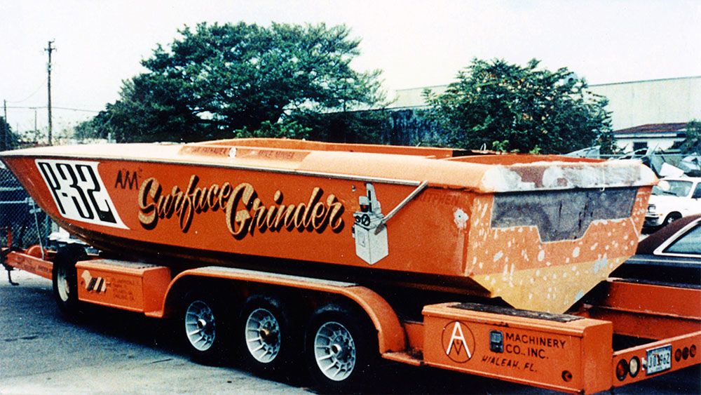 A saturate coloured photo of part of Surface Grinder, painted orange