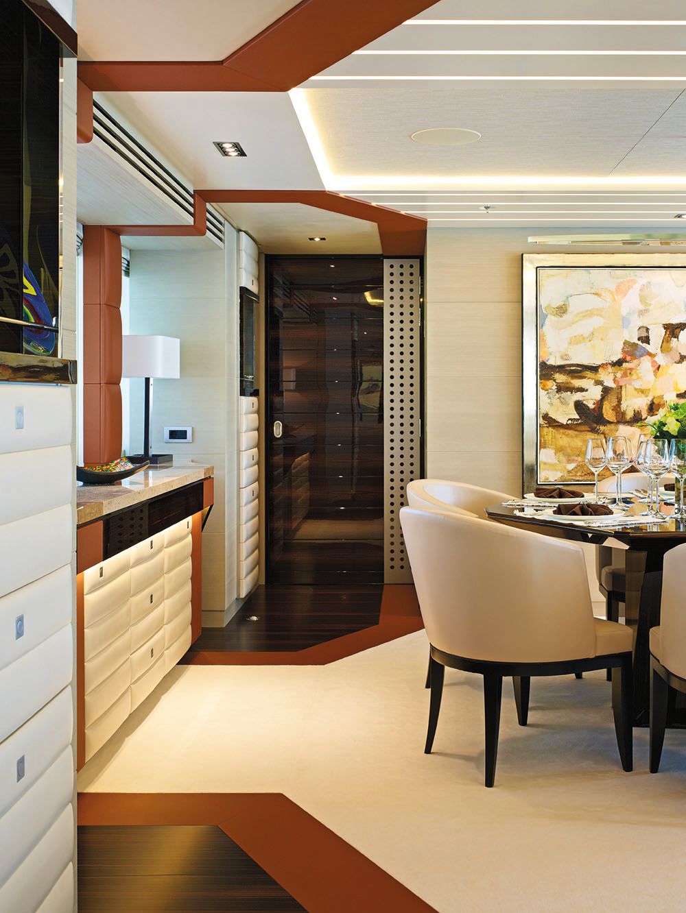 Pre-refit decor in neutral colours with orange accents