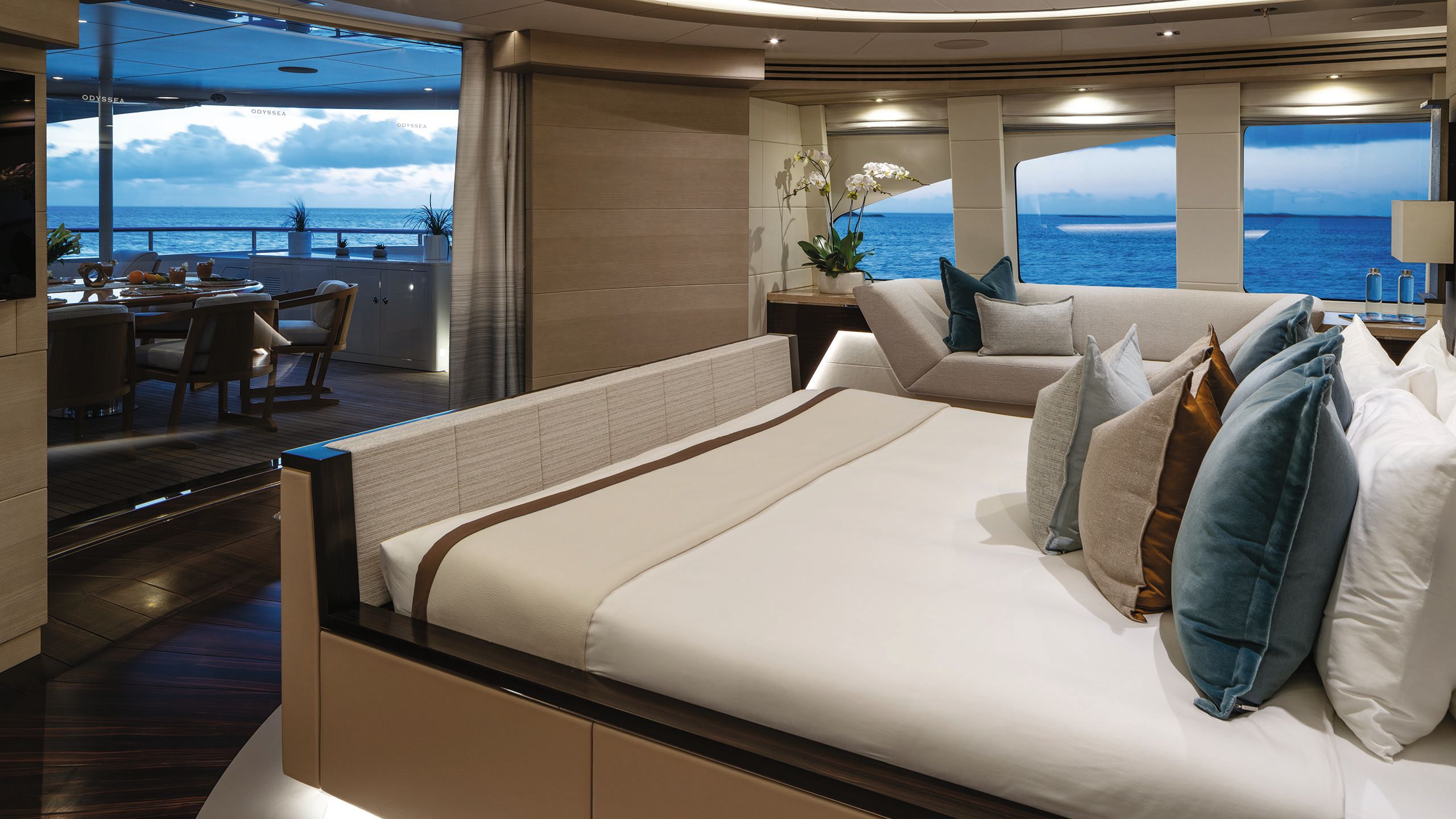 Owner's cabin, taken from the side and looking across the bed, which is at the centre of the room