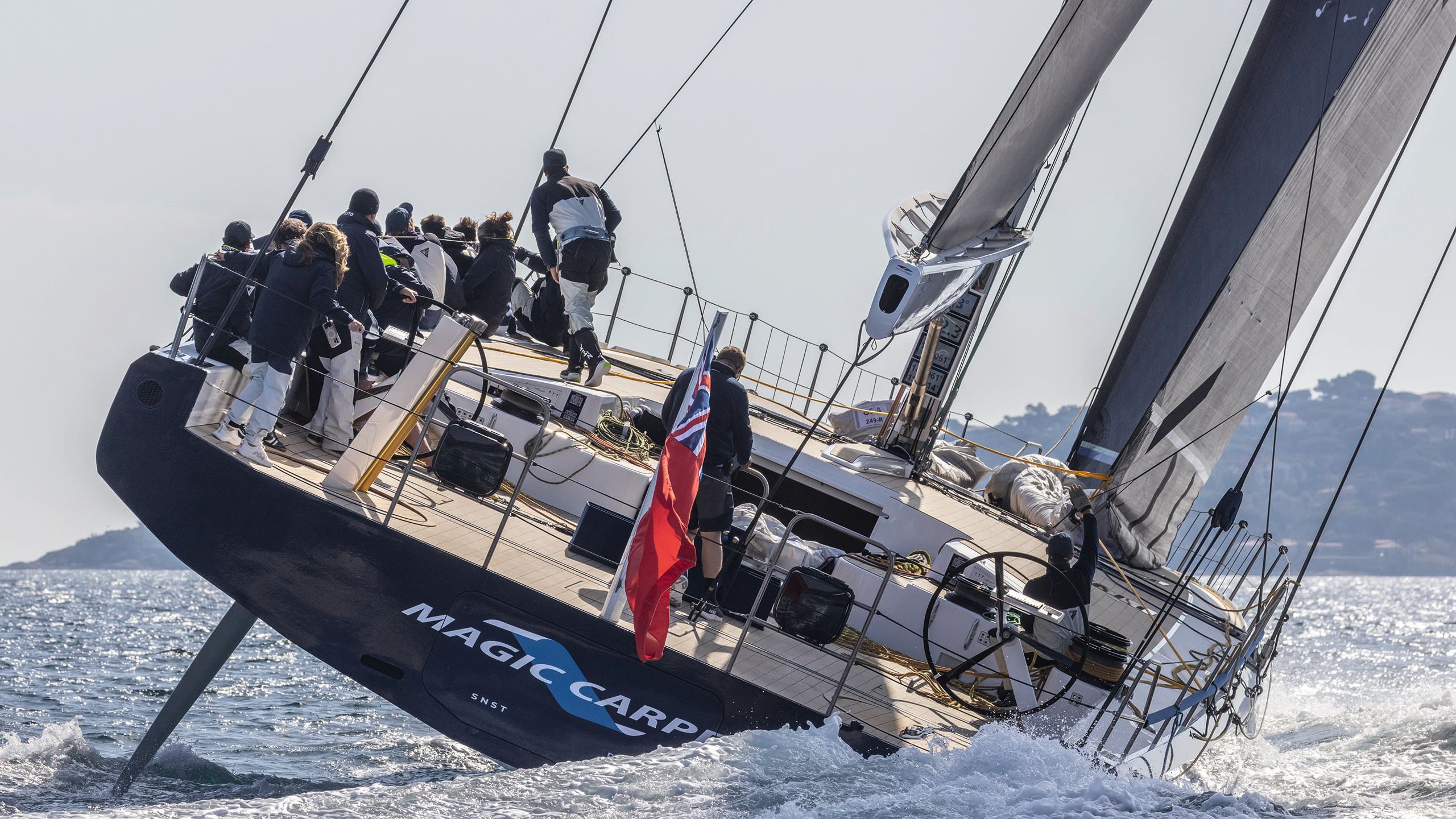 View of Magic Carpet E on the water from the back, it is tilted to the side