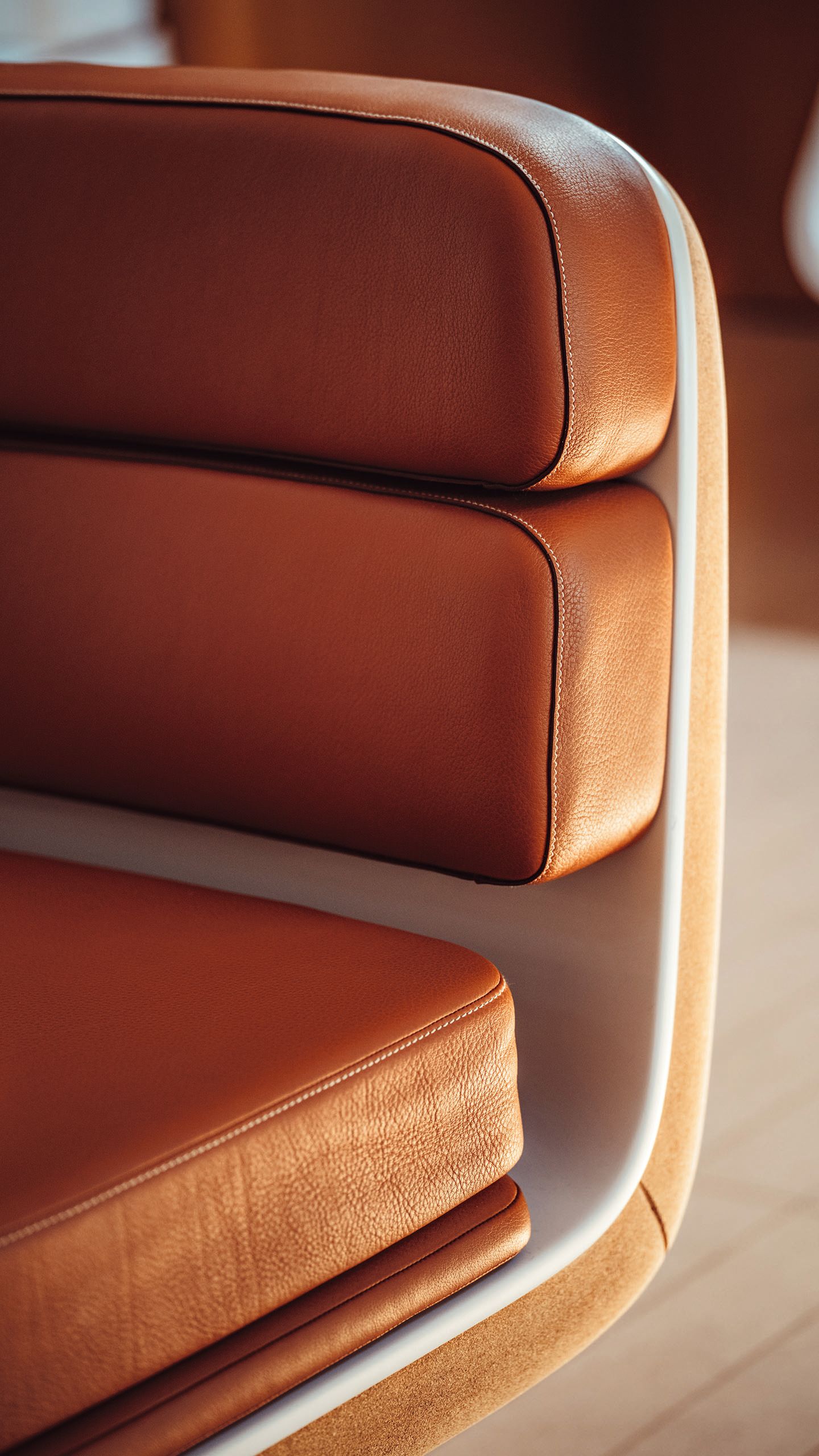 Close-up of tan leather detailing on a seat