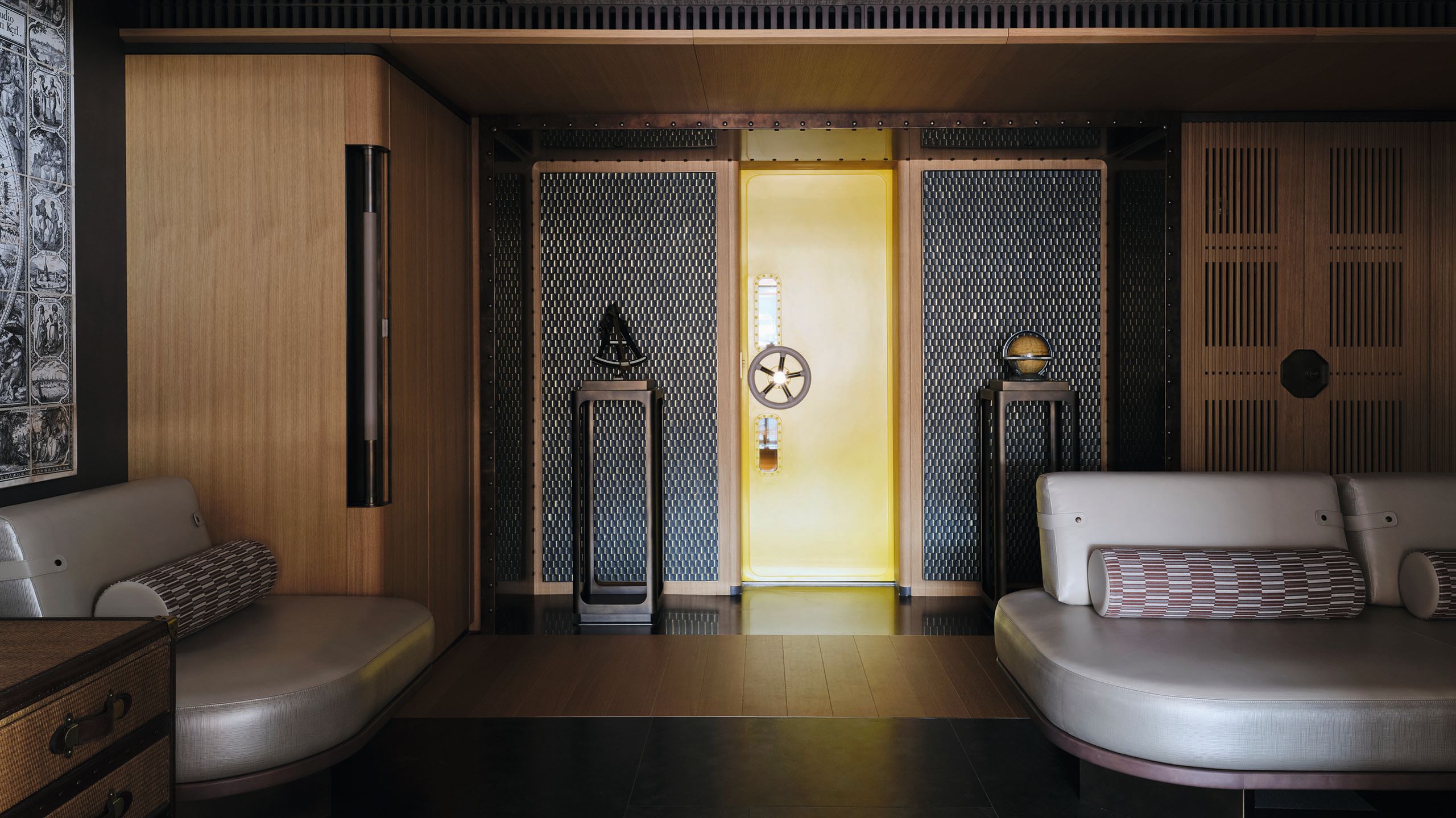 Wide view of the mud room, which has a yellow door with wheel handle