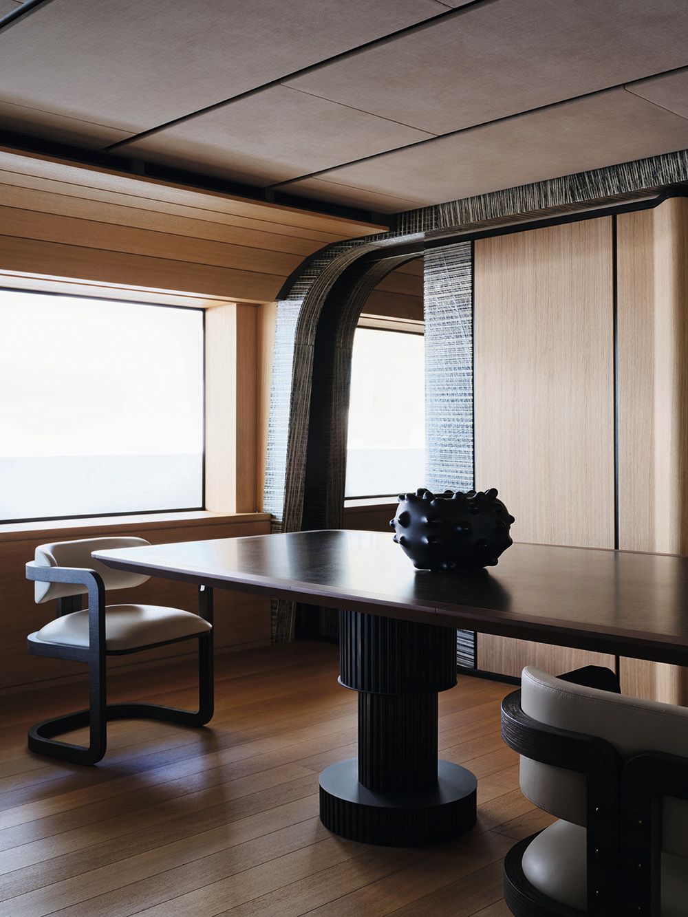 Dark wood dining table with white dining chair