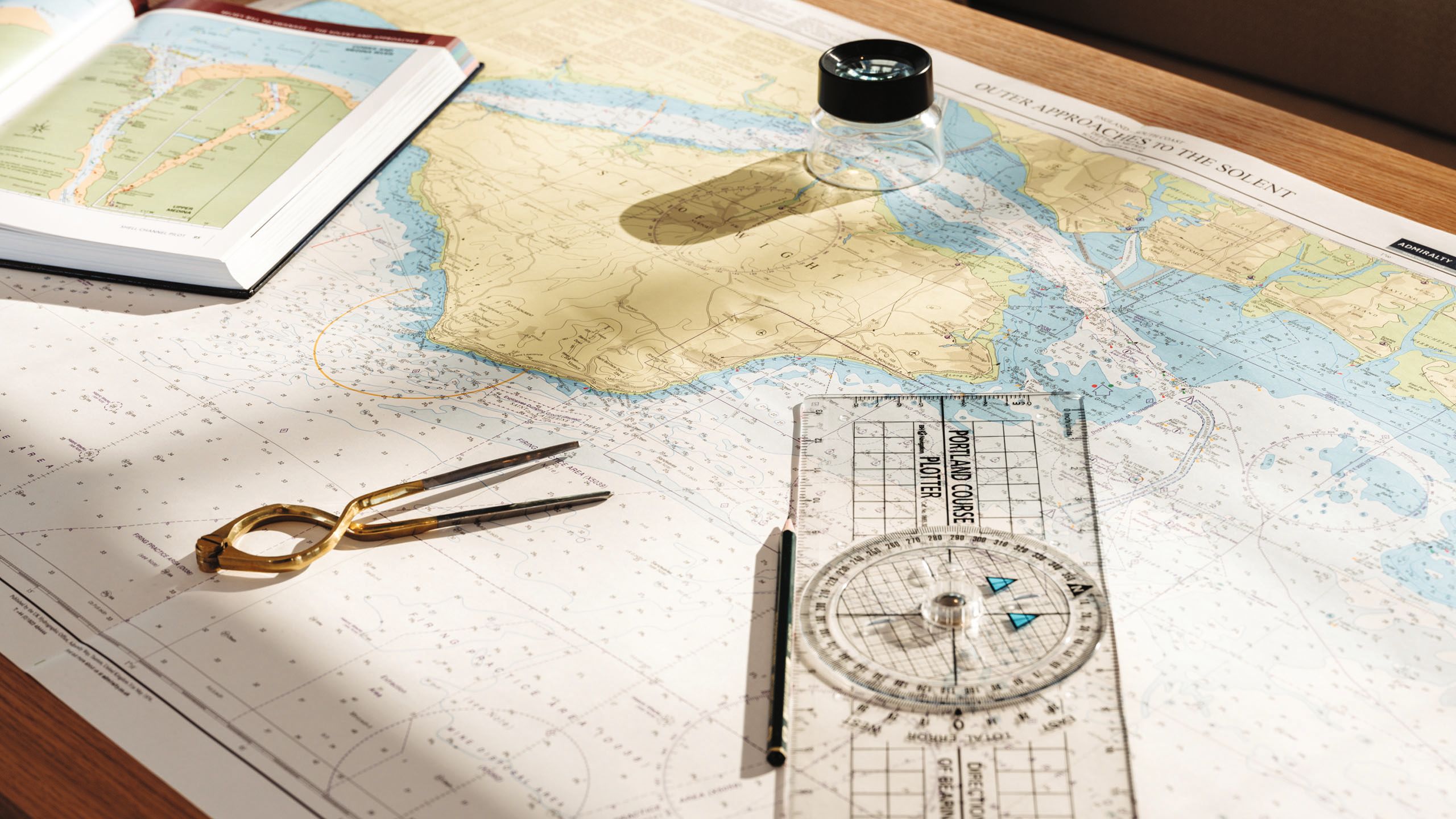 Close-up of map and navigational tools