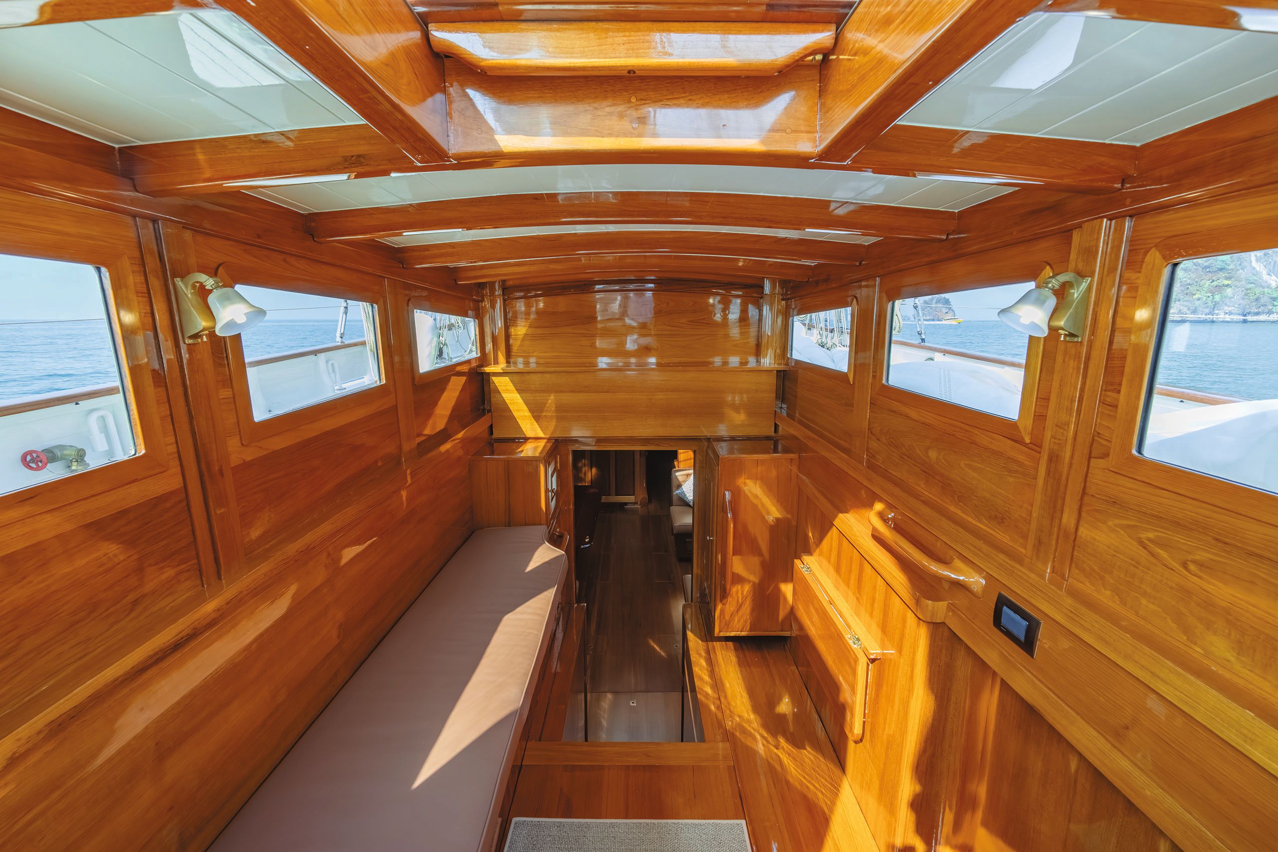 Interior of the deckhouse, which is orange-toned wood