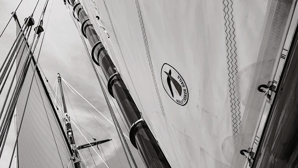 Close-up black and white shot of the logo on the sails