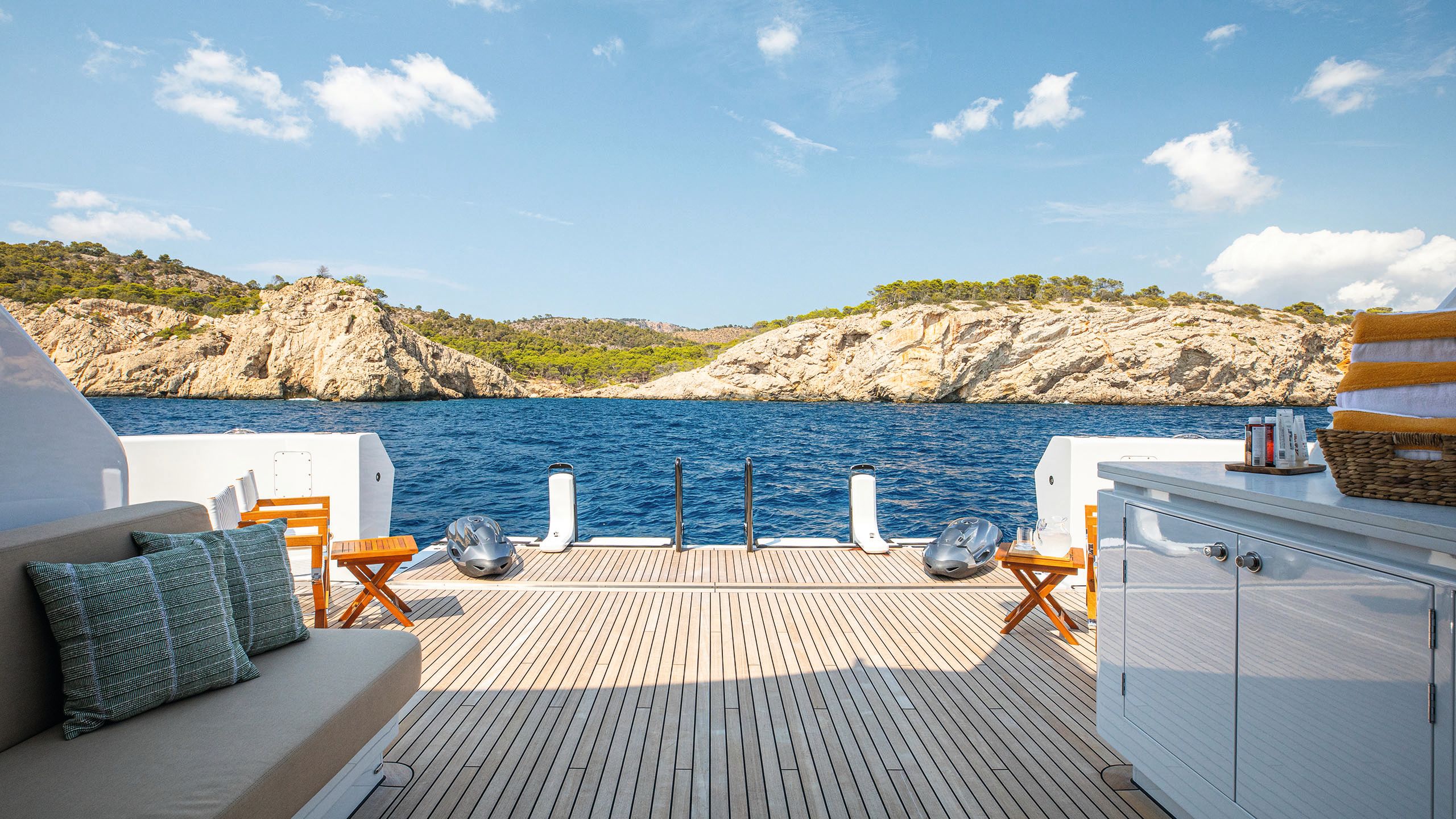 Looking down the sundeck towards a ladder at the end