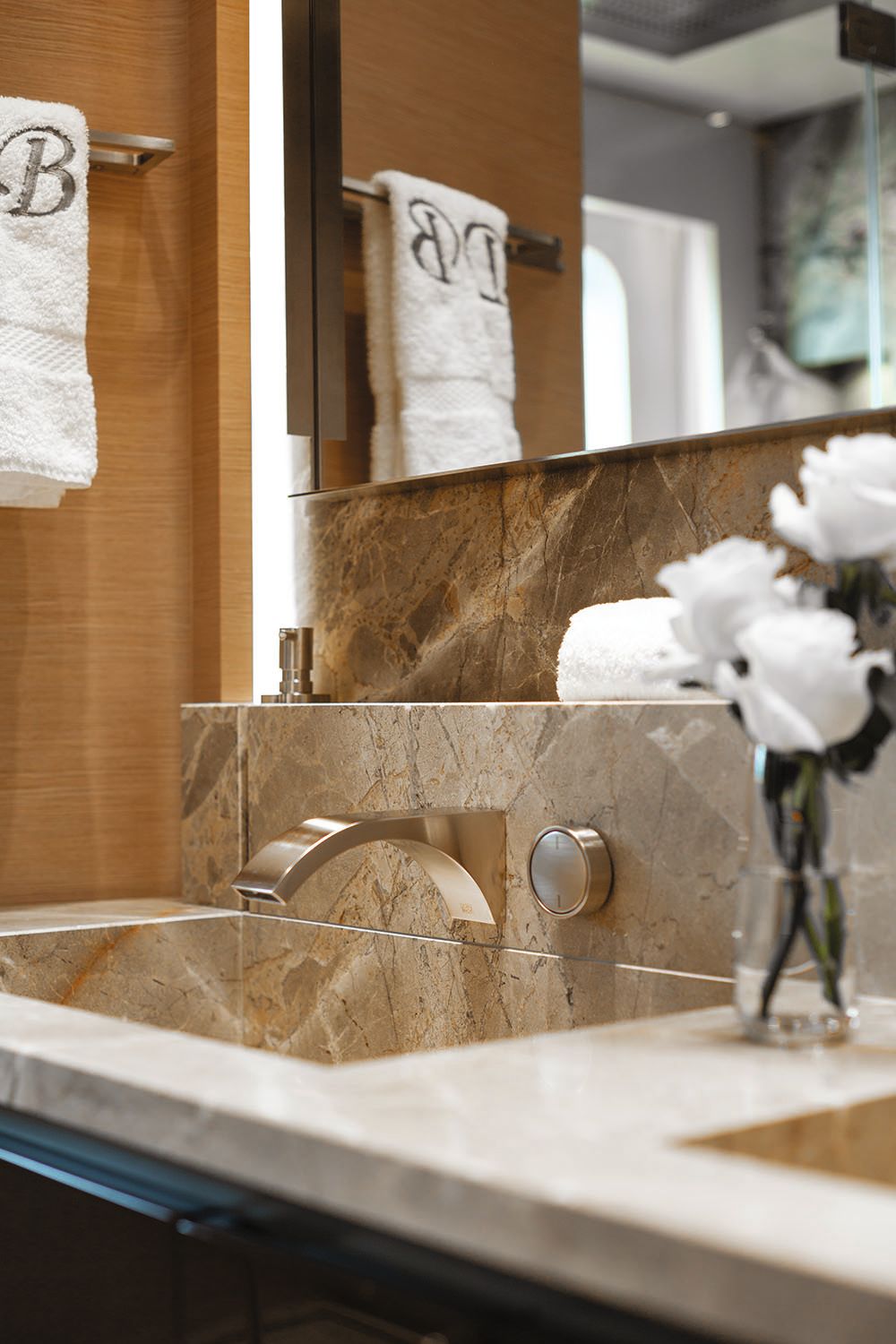 Close-up of the brushed gold tap