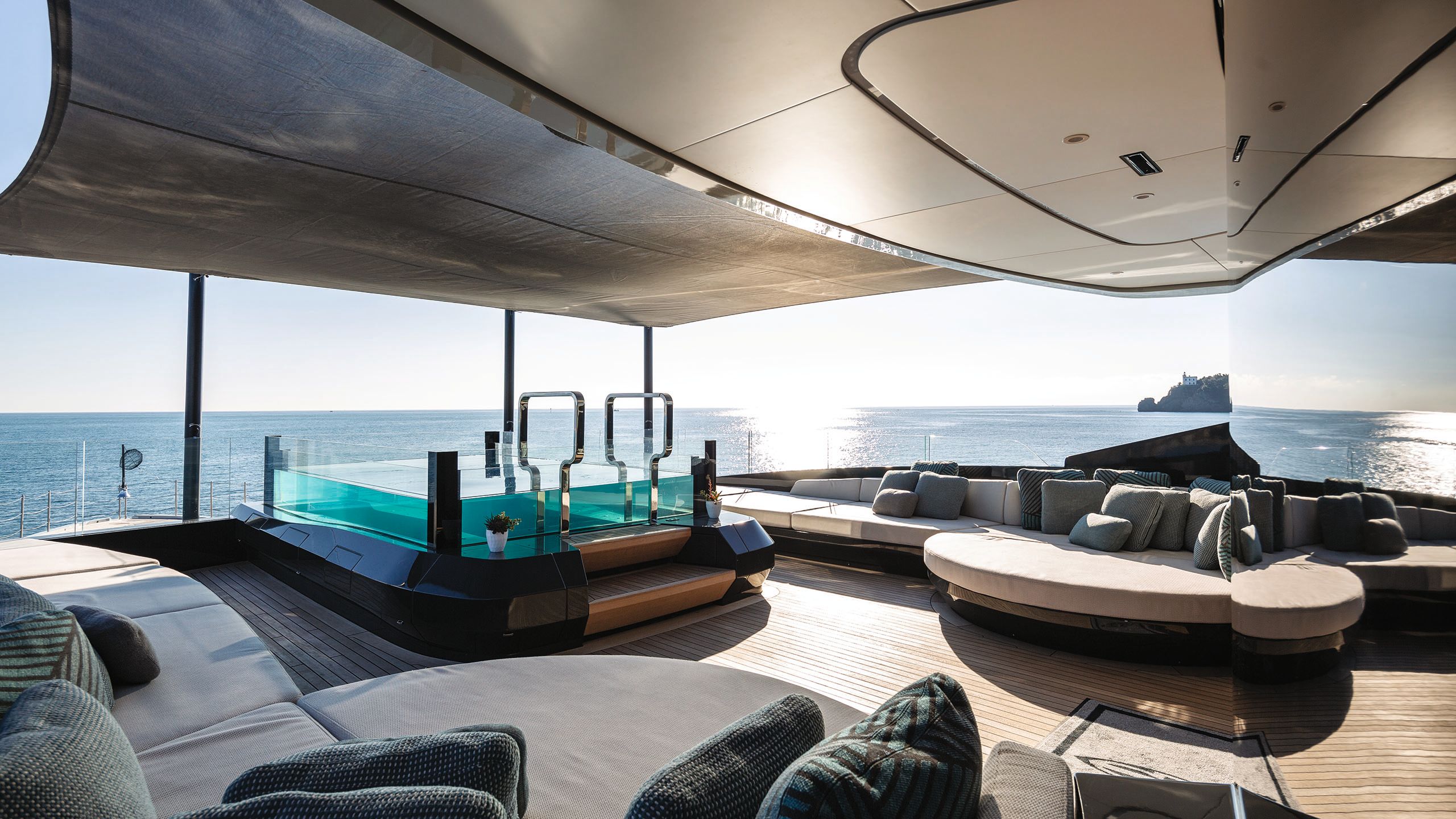 Glass-sided spa on covered outdoor deck