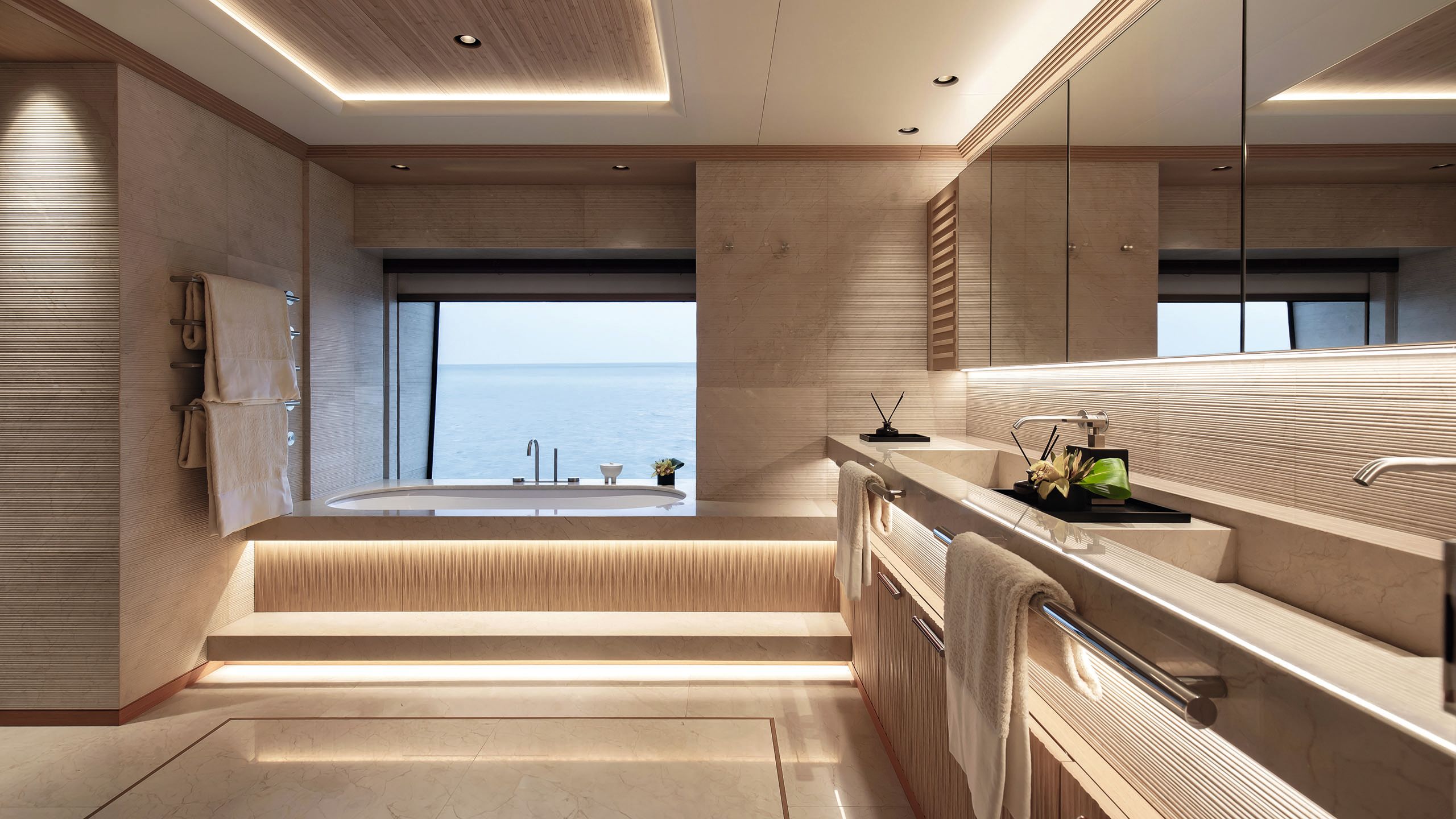 Alt view of the larger bathroom facing the bath which has a large picture window