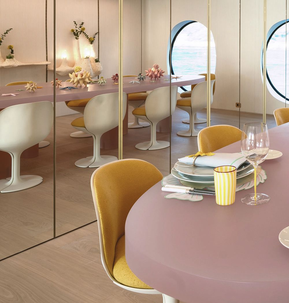 A close-up of the yellow-upholstered chairs