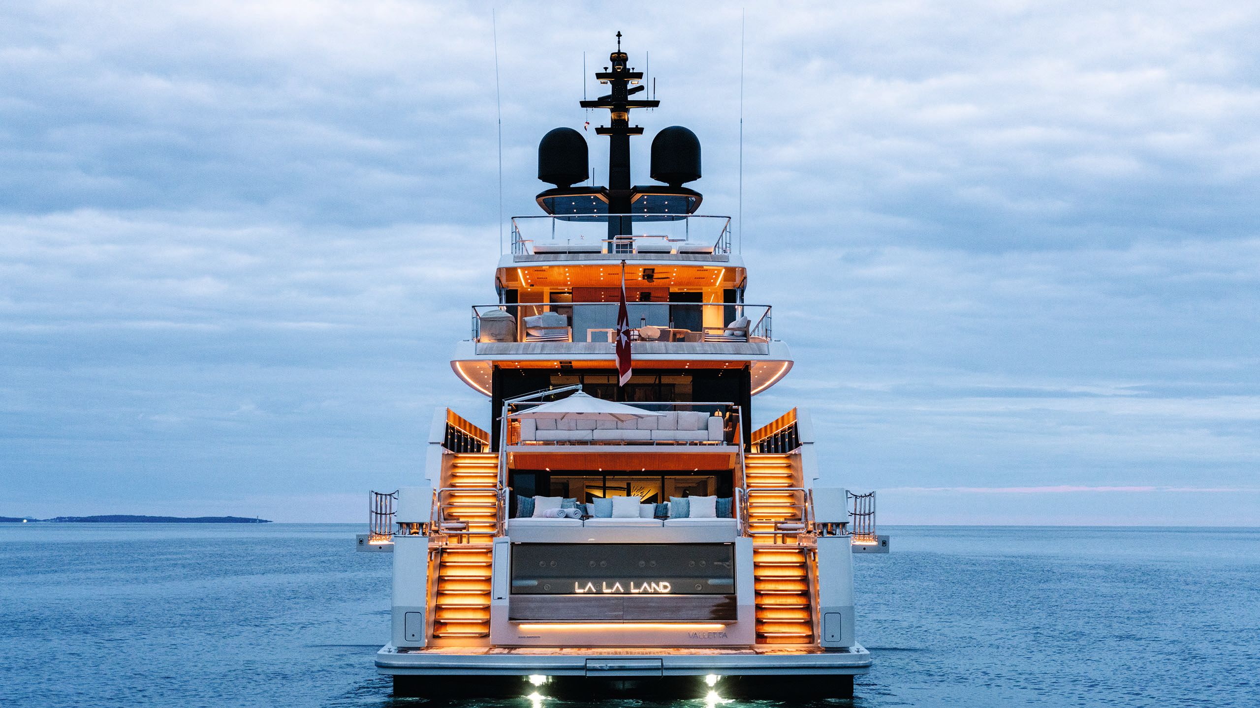 Stairs either side of the back of La La Land are lit with warm lighting