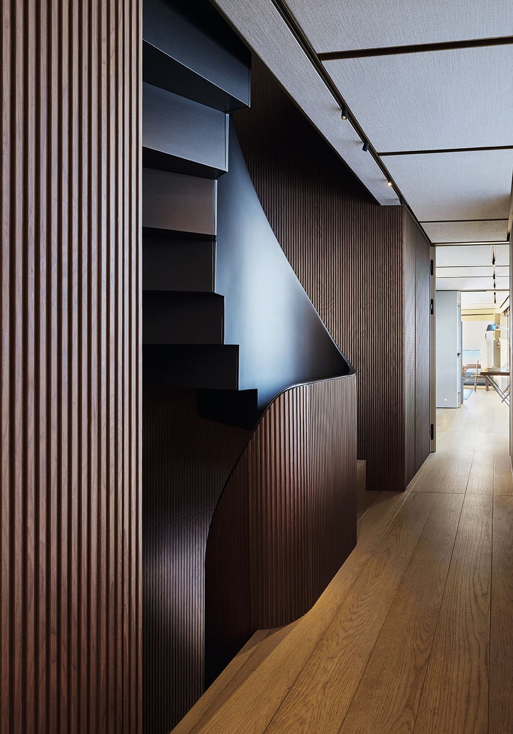 Looking down the side of the ribbing along the staircase